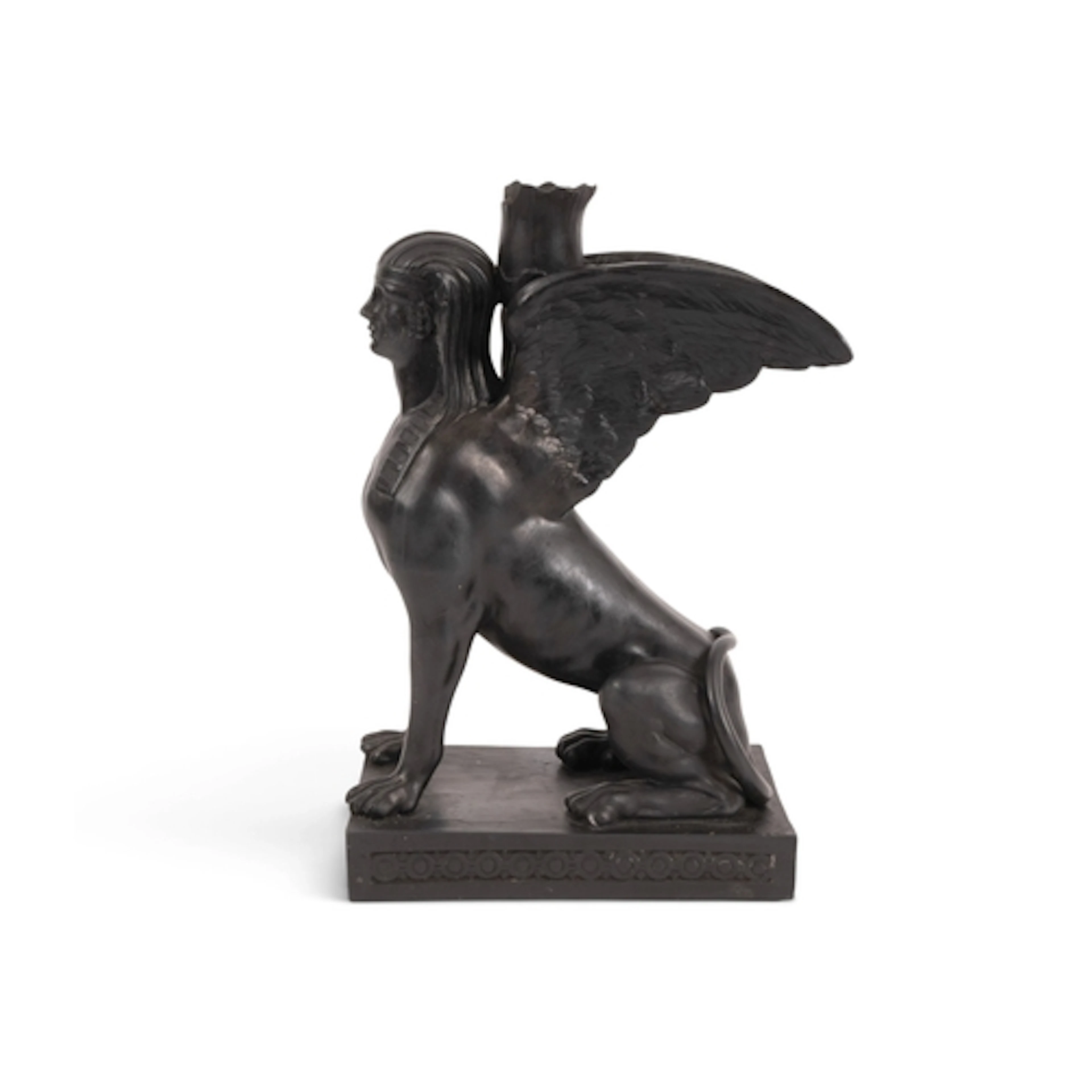 A Wedgwood black basalt sphinx candlestick, early 19th centu...