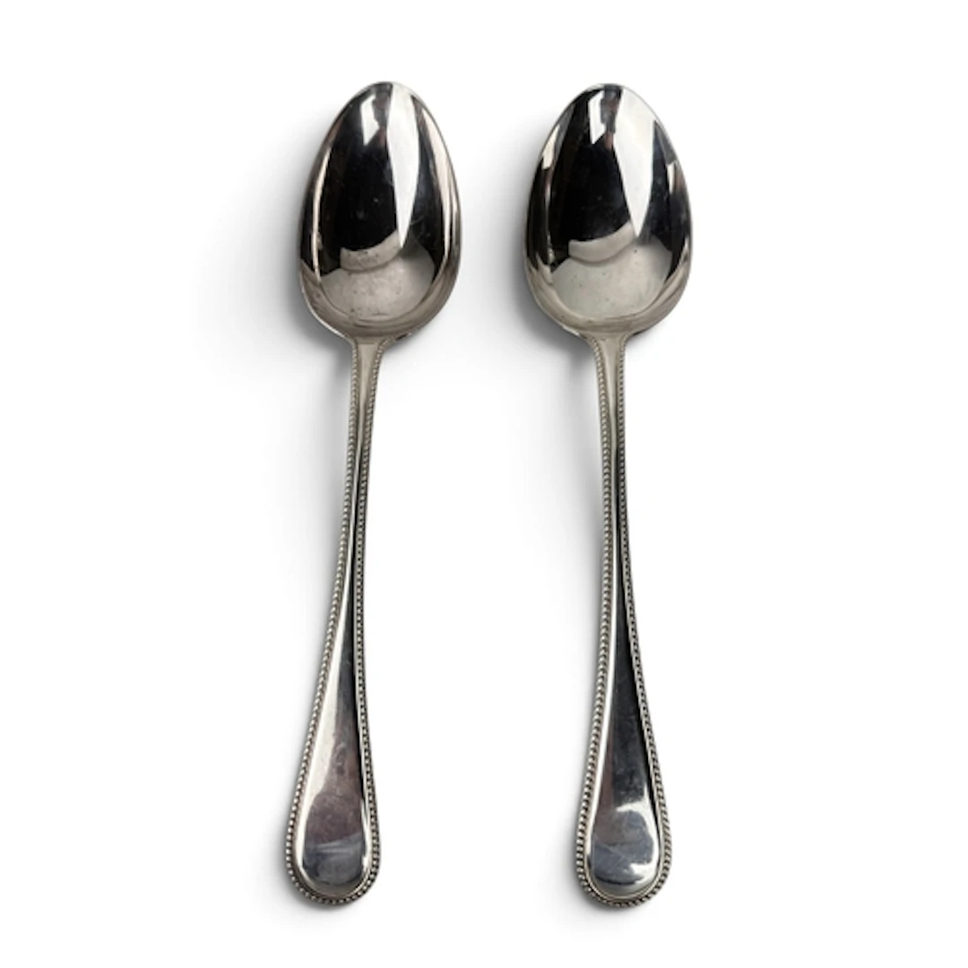 A PAIR OF VICTORIAN SILVER OLD ENGLISH BEAD EDGE TABLESPOONS...