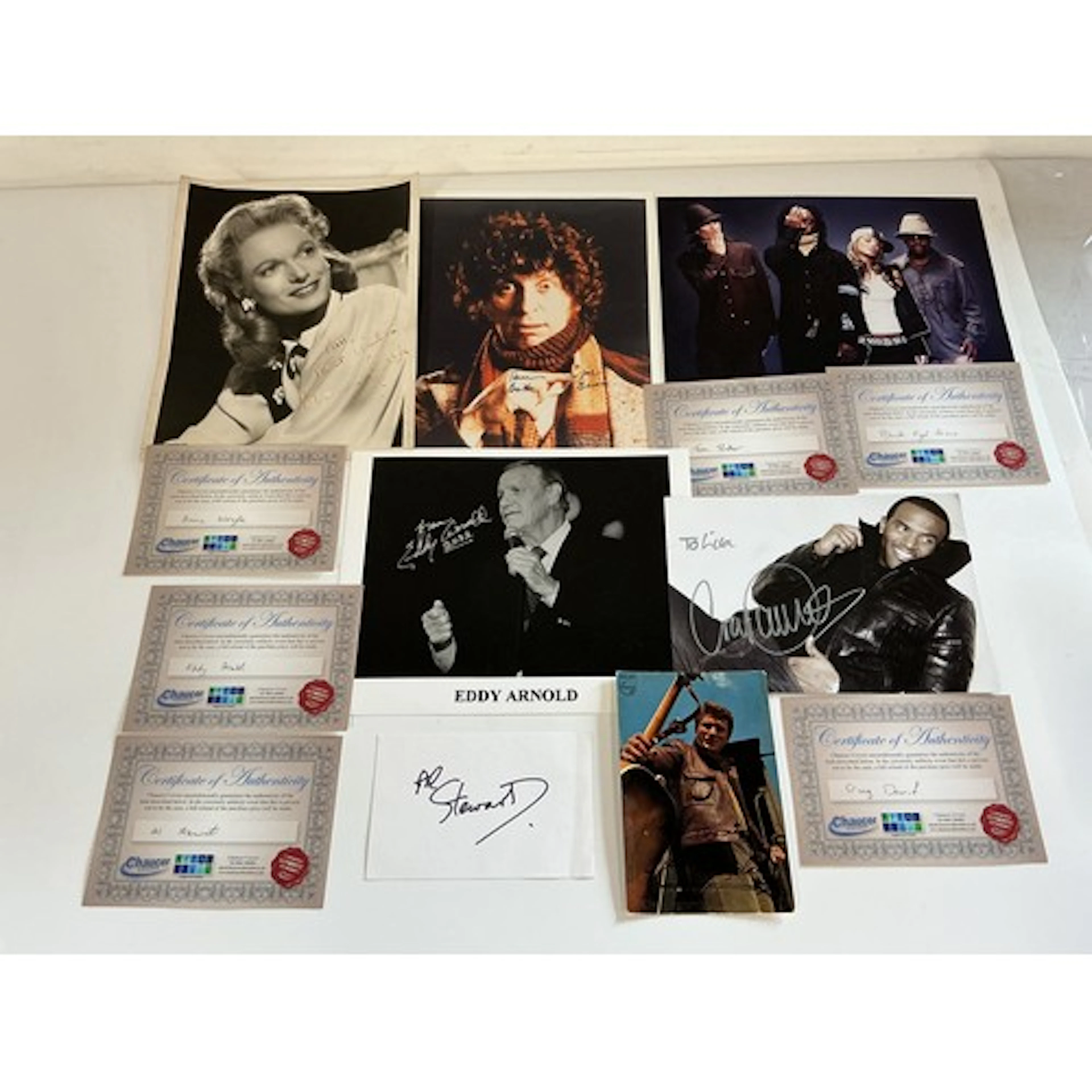 A collection of autographs including Tom Baker, Johnny Hally...