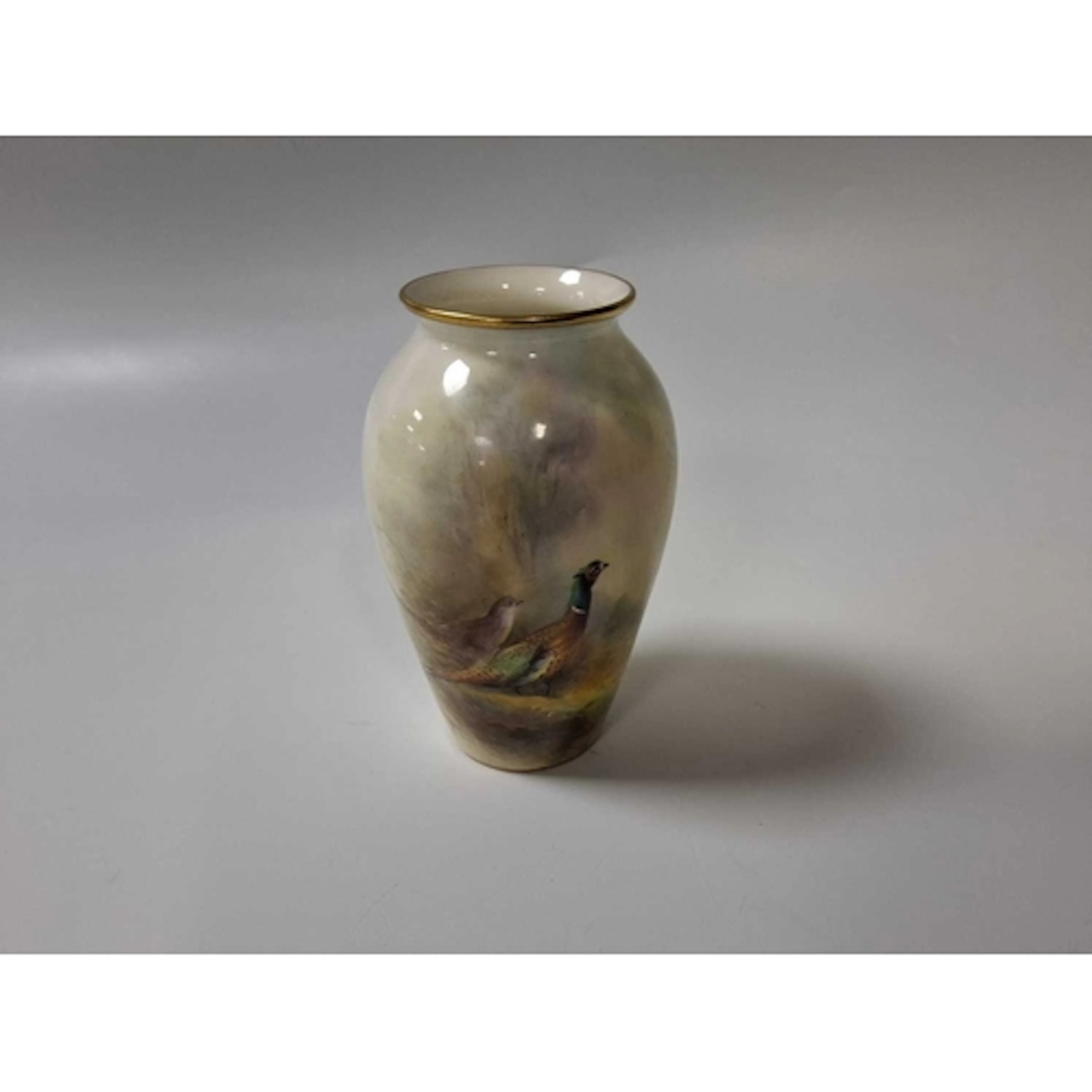 A SMALL ROYAL WORCESTER PORCELAIN OVOID VASE, hand-painted b...