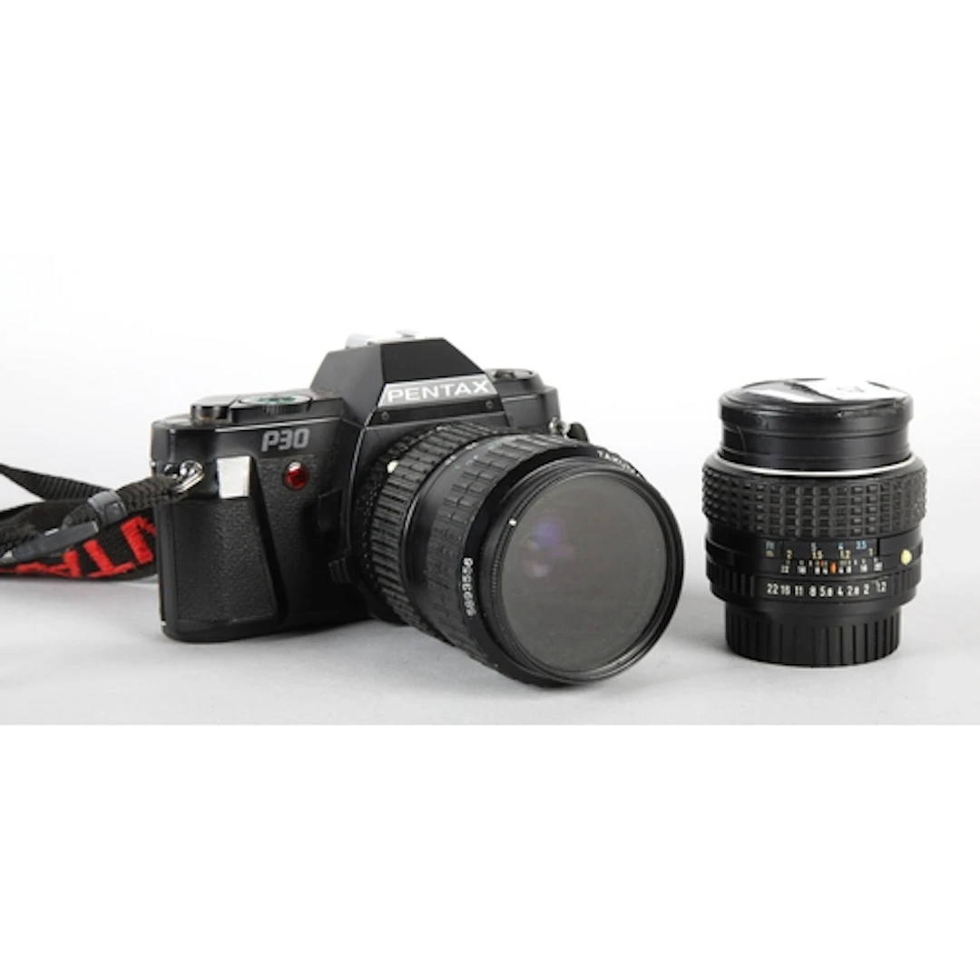 Pentax P30 camera, with lens attachment.