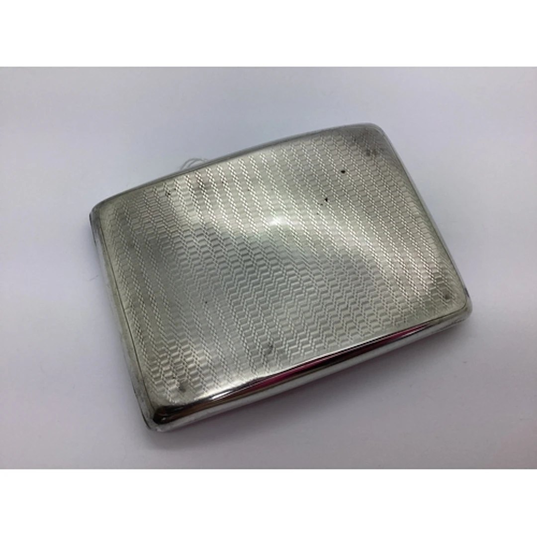 A Hallmarked Silver Cigarette Case, of rounded rectangular f...