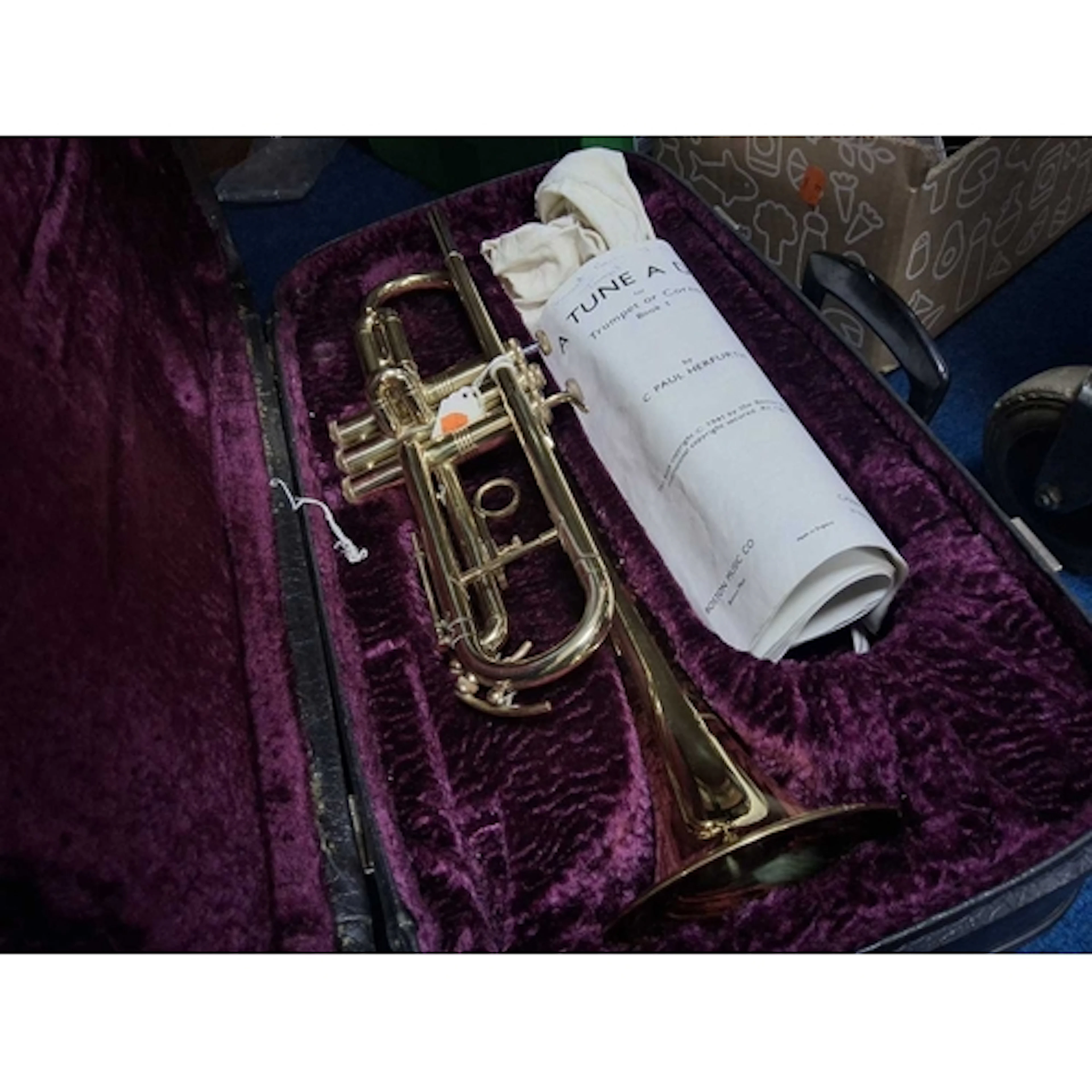 A CASED 'LA FLEUR' TRUMPET imported by Boosey and Hawkes of ...