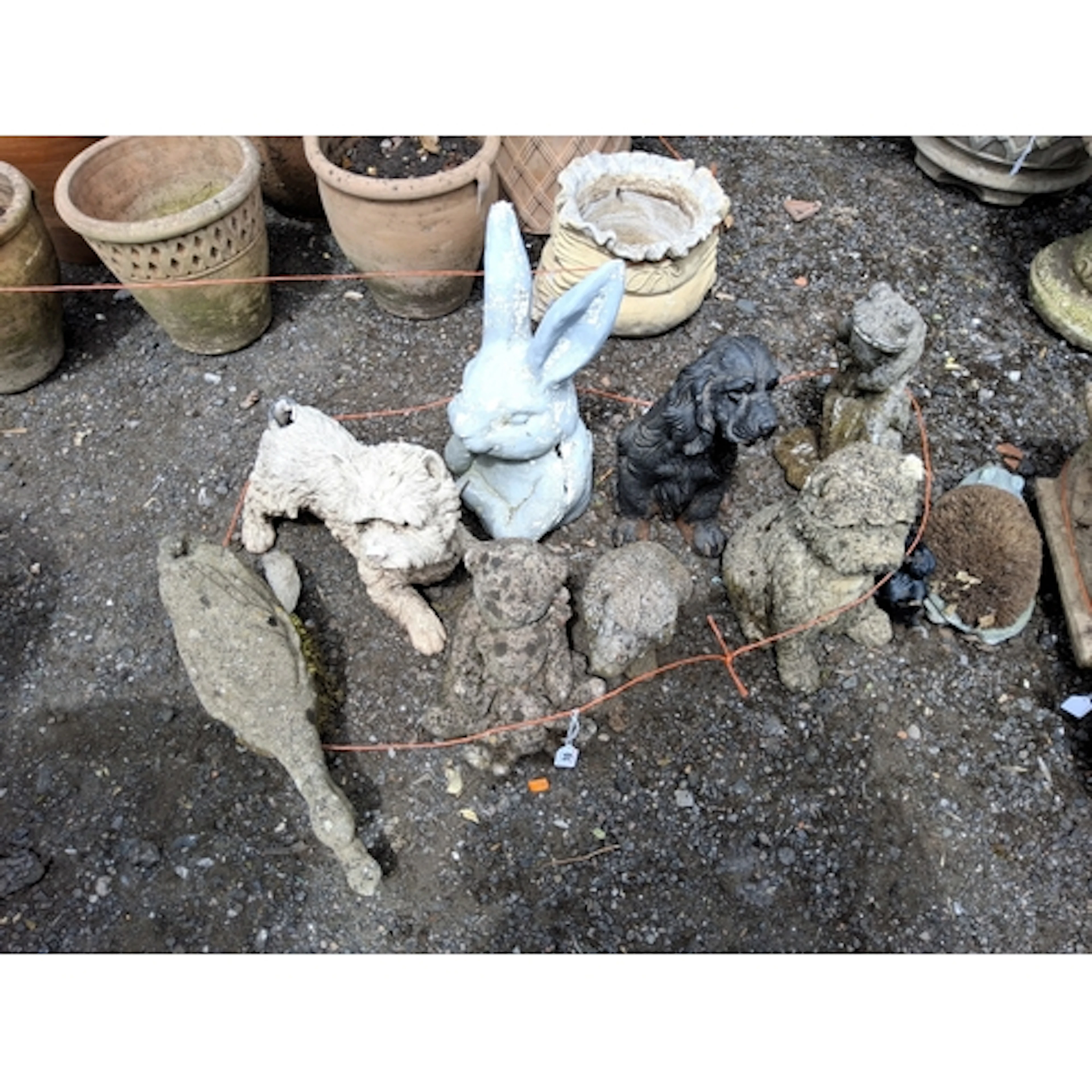 A COLLECTION OF GARDEN FIGURES, including a modern cast iron...