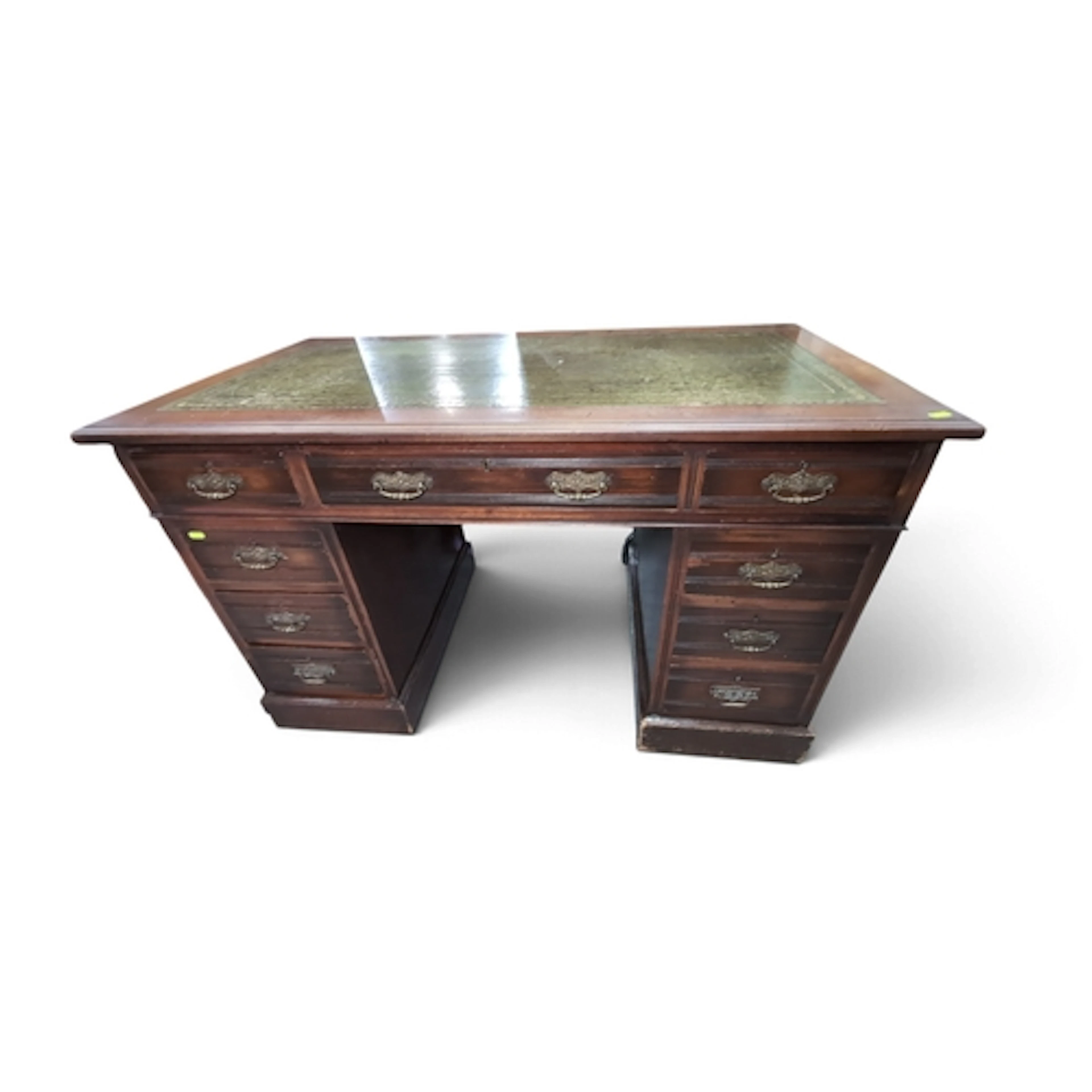 Mahogany twin-pedestal desk with an inset green gilt-tooled ...
