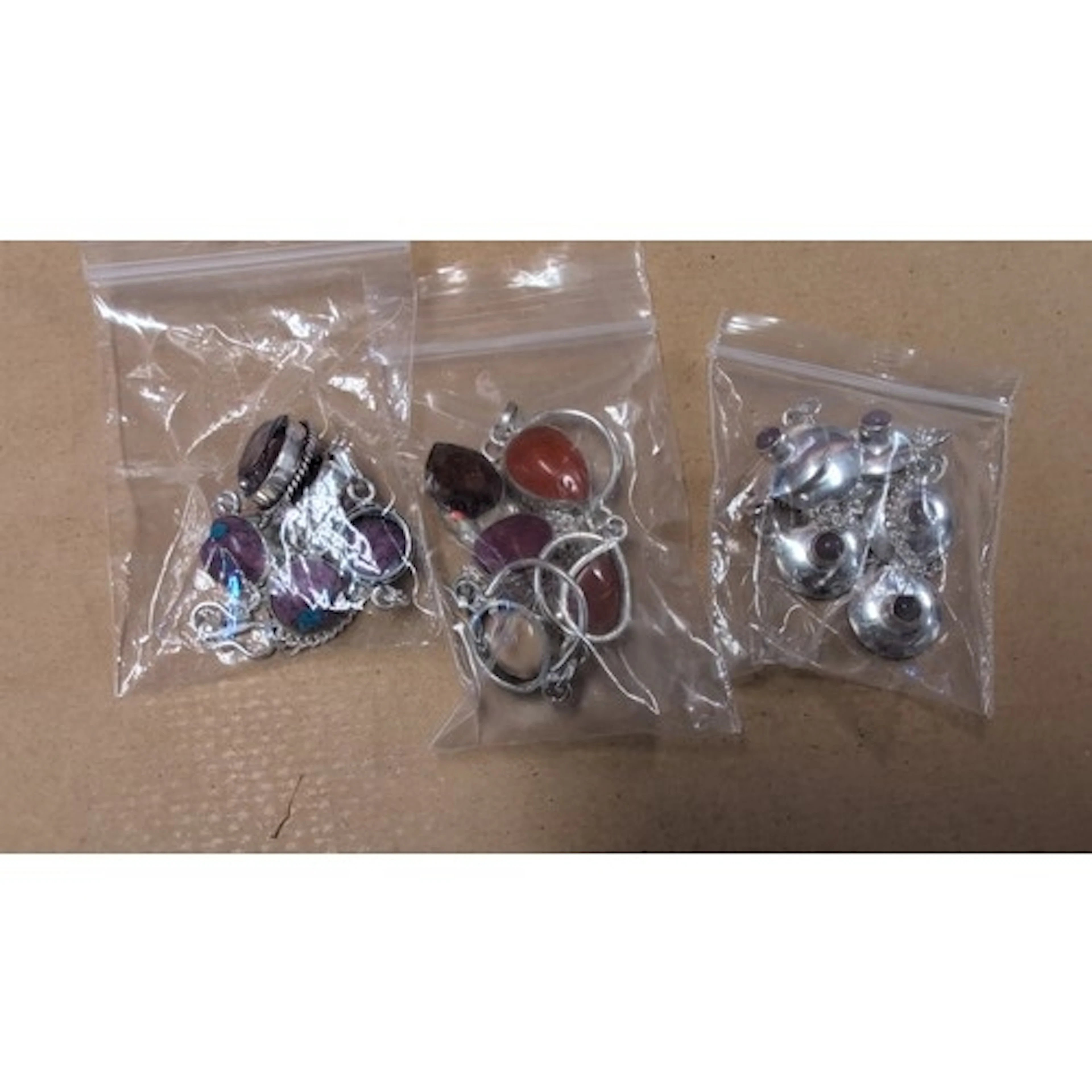 An assortment of 925 Silver jewellery including cabochon-set...