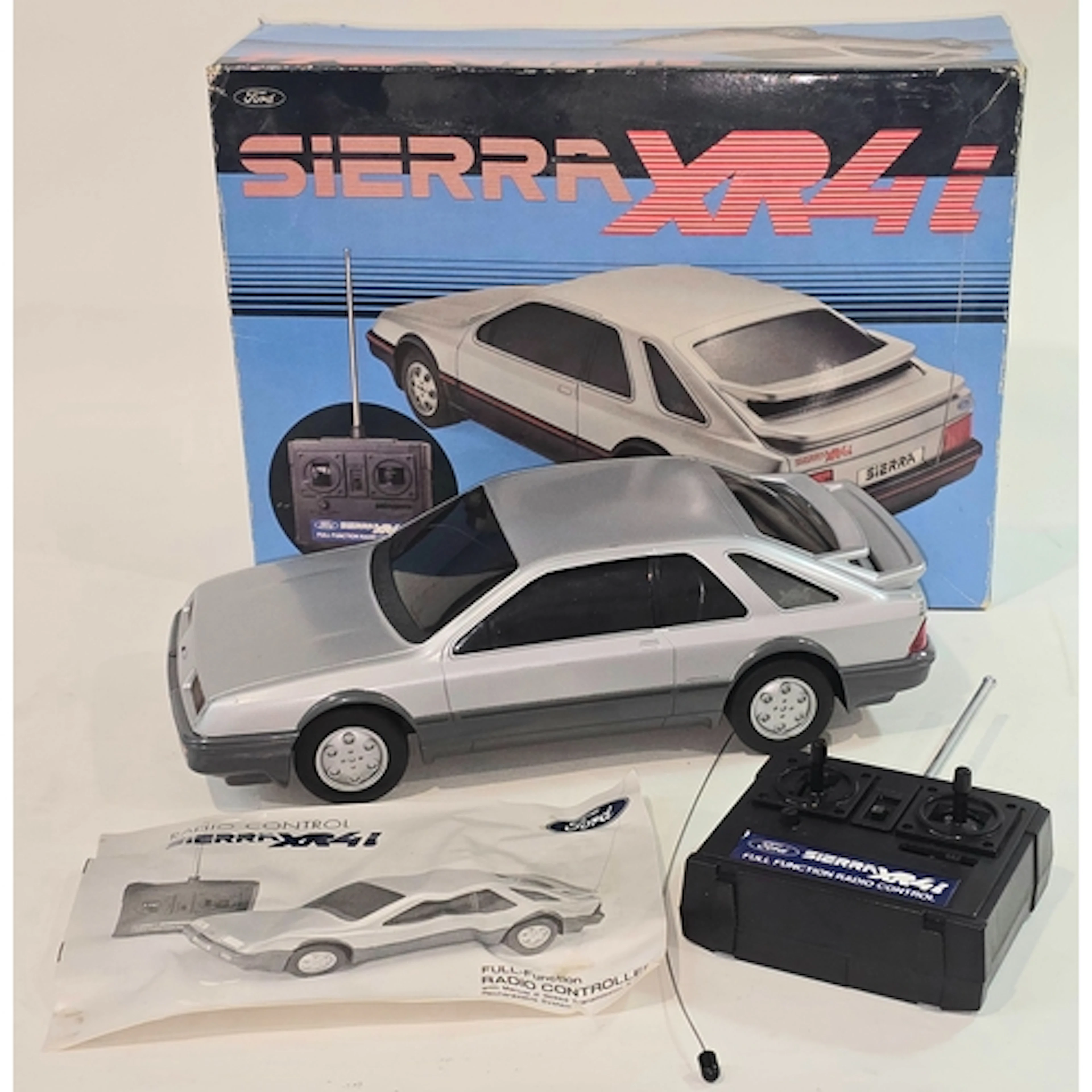 A vintage Radio Controlled Ford Sierra XR4i RC-1332 car appe...