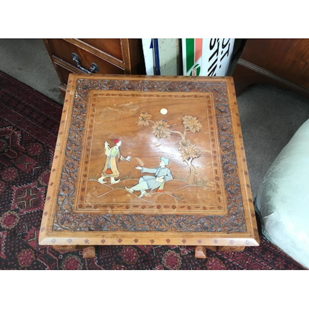 vintage hand inlaid wooden marquetry table depicting a tradi...
