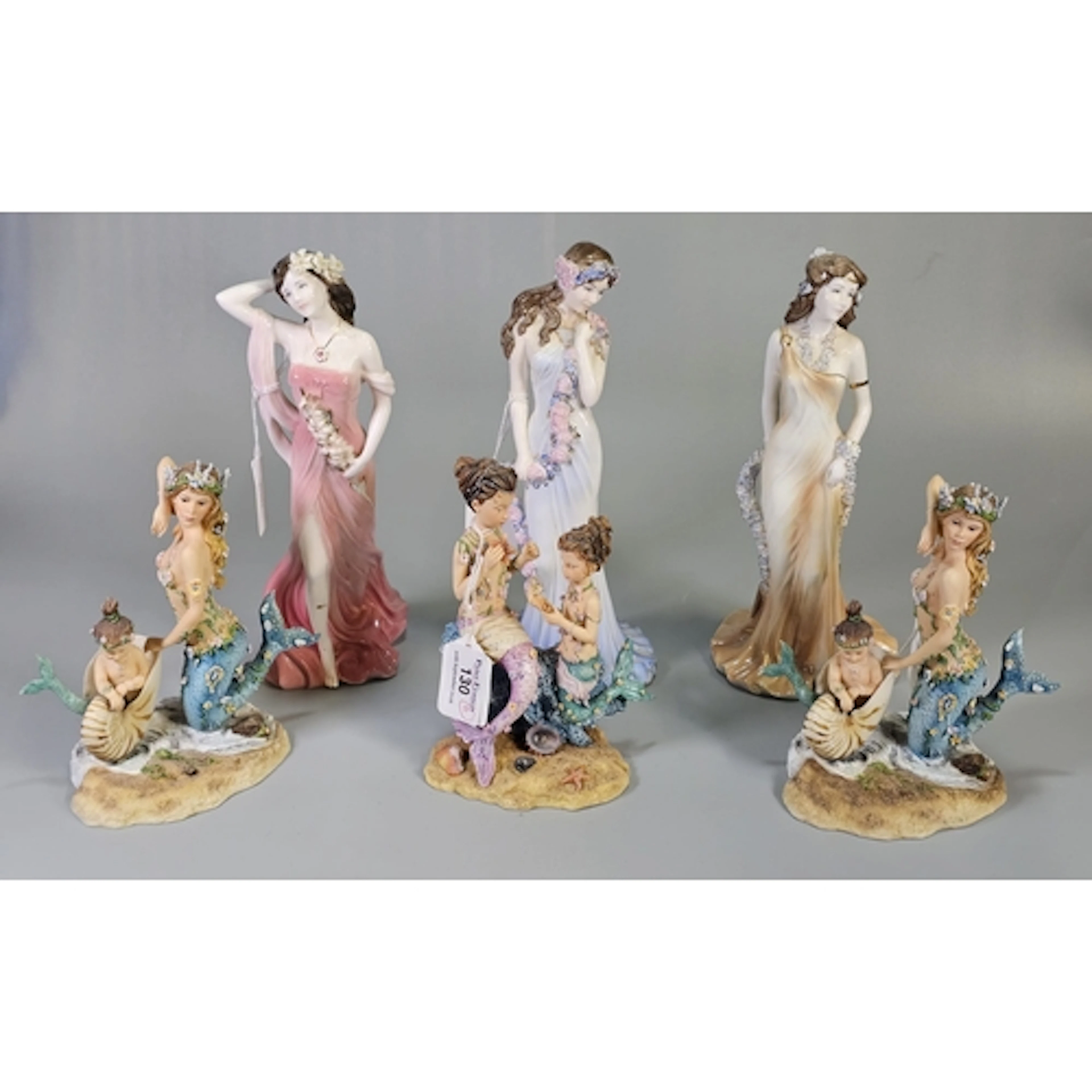 Three Coalport bone china figurines, to include ‘Ruby’, ‘Sap...