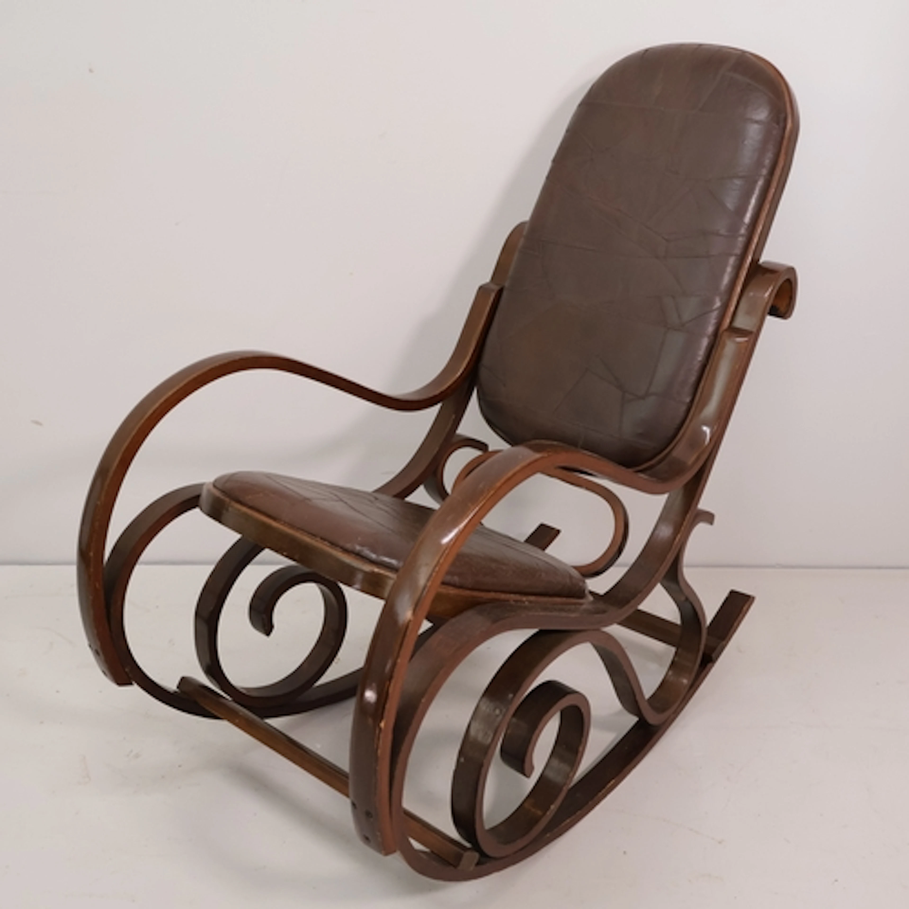 A vintage bentwood rocking chair designed by Luigi Crassevig...