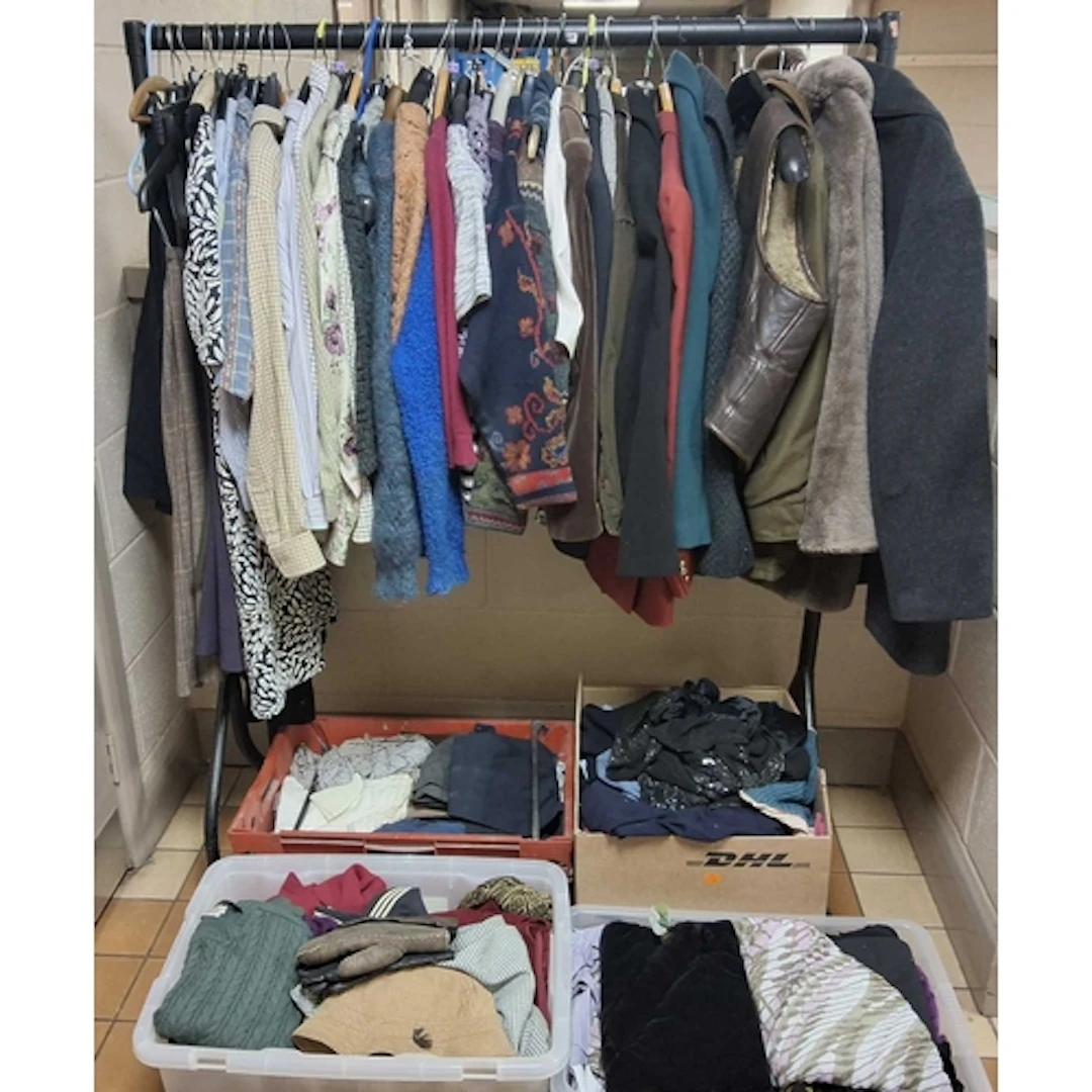 FOUR BOXES OF LOOSE WOMEN'S CLOTHING, including some vintage...