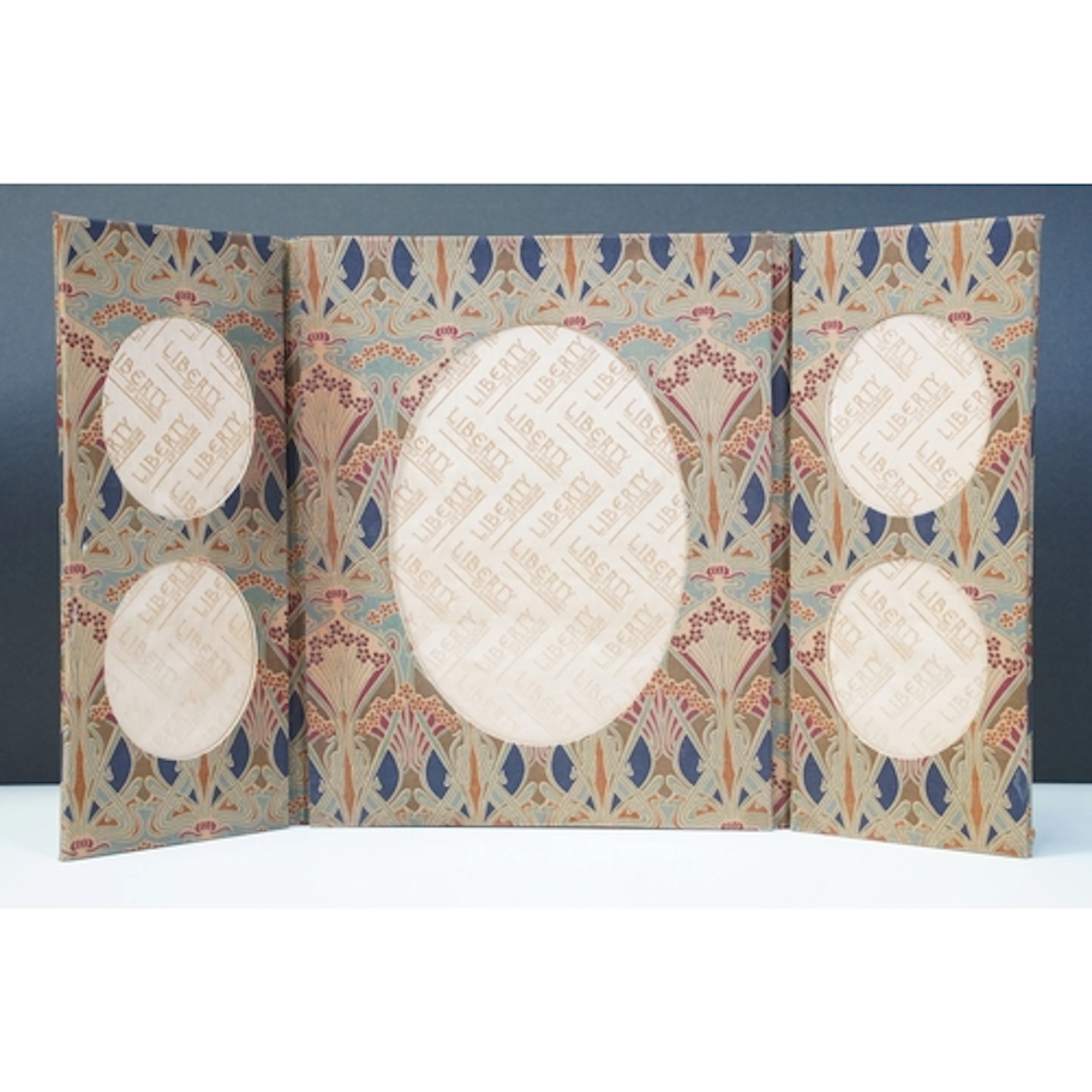 Liberty of London folding photograph frame opening to five o...