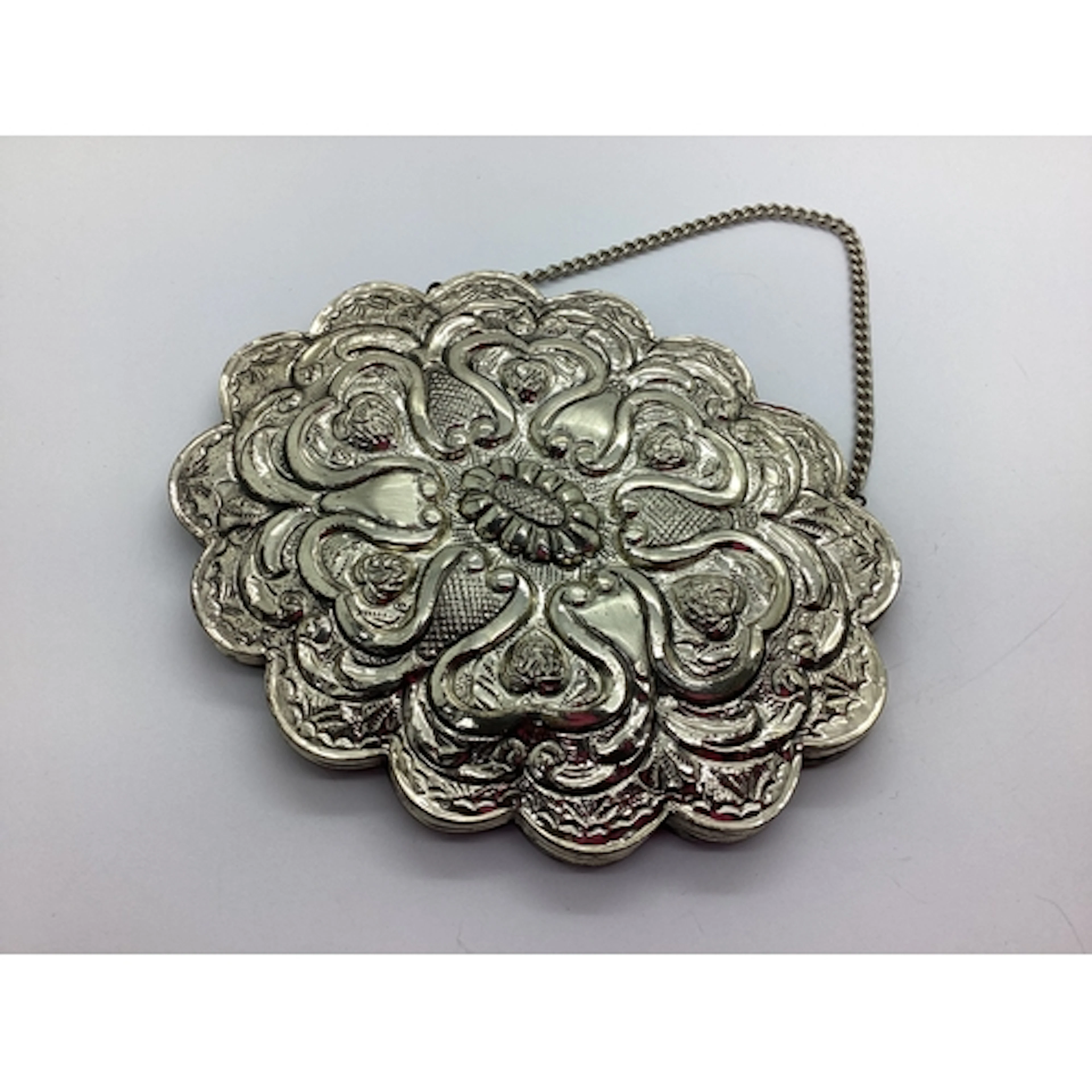 An Ornate Turkish Style Wedding Mirror, of repoussé design w...