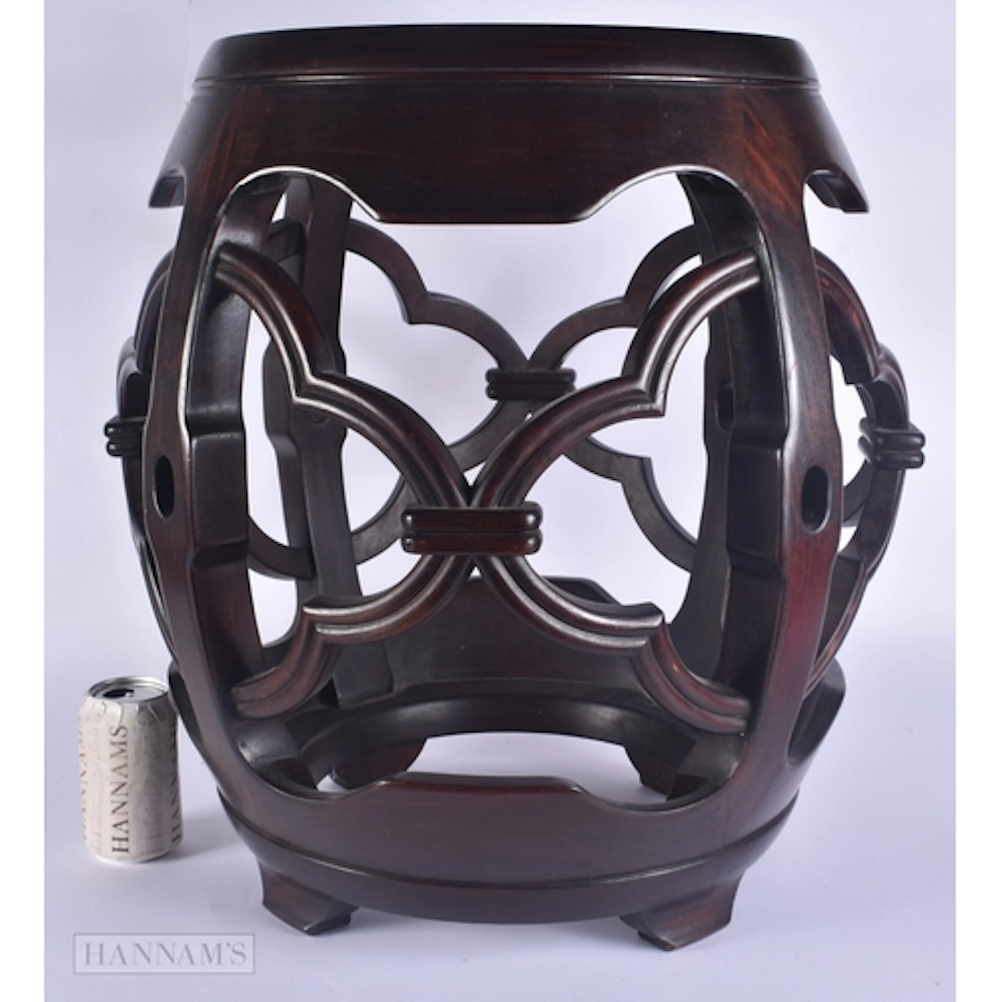 A 19TH CENTURY CHINESE HARDWOOD MARBLE INSET BARREL SEAT. 55...
