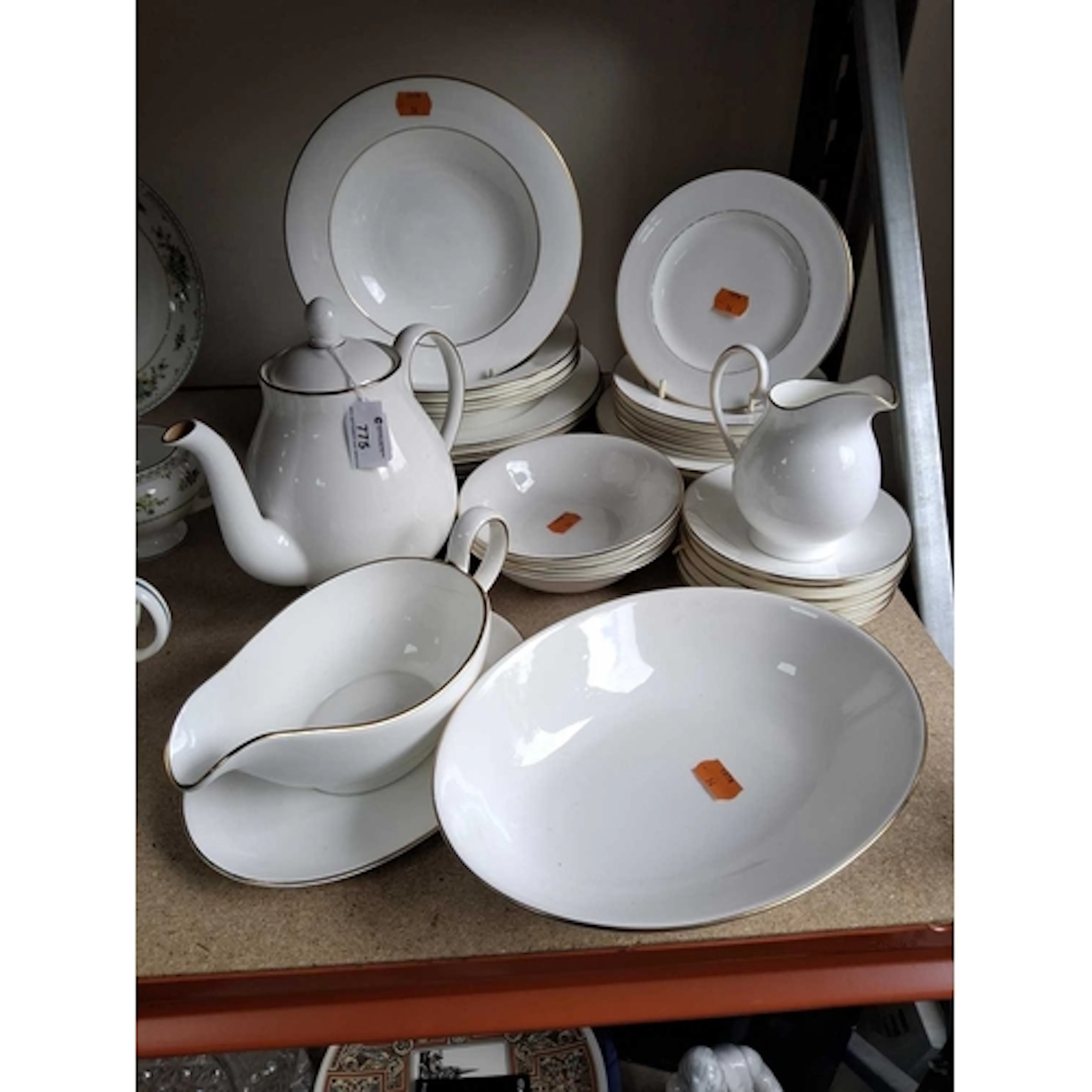 A ROYAL DOULTON 'SIGNATURE GOLD' DINNER SERVICE comprising f...