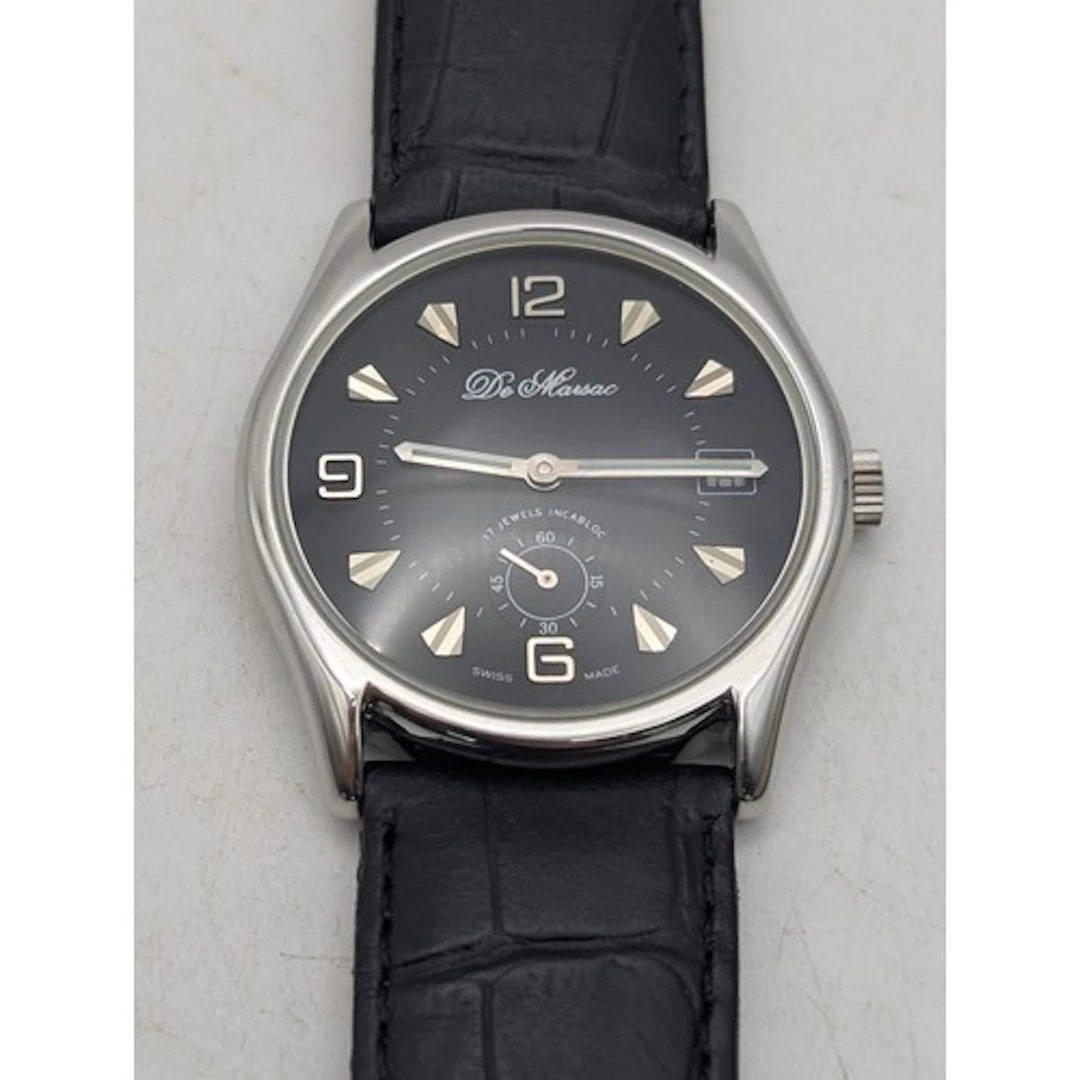 A gents stainless steel wristwatch, having black dial on bla...