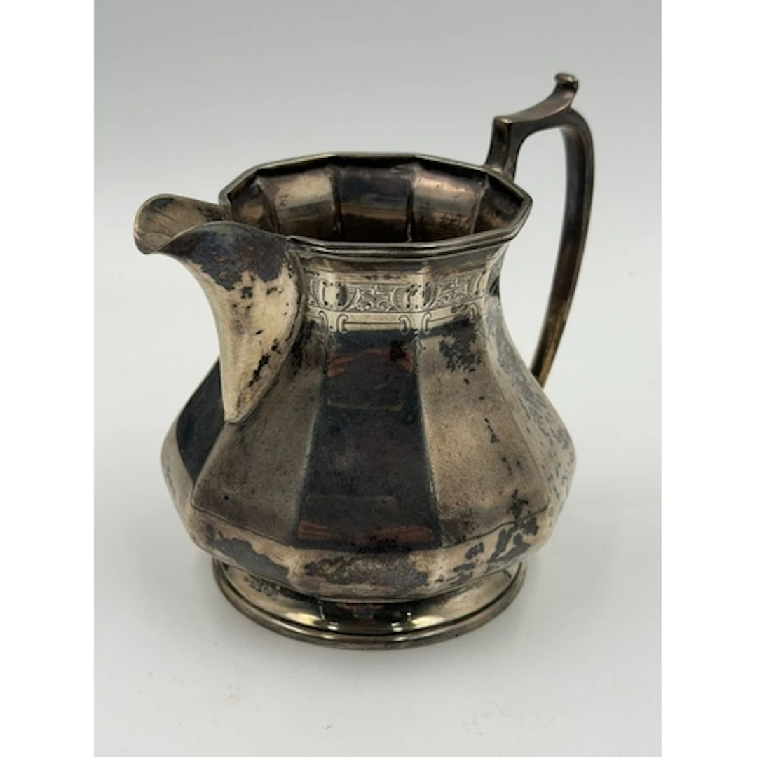 A hallmarked silver milk jug, approximate weight 249g, Sheff...