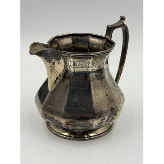 A hallmarked silver milk jug, approximate weight 249g, Sheff...