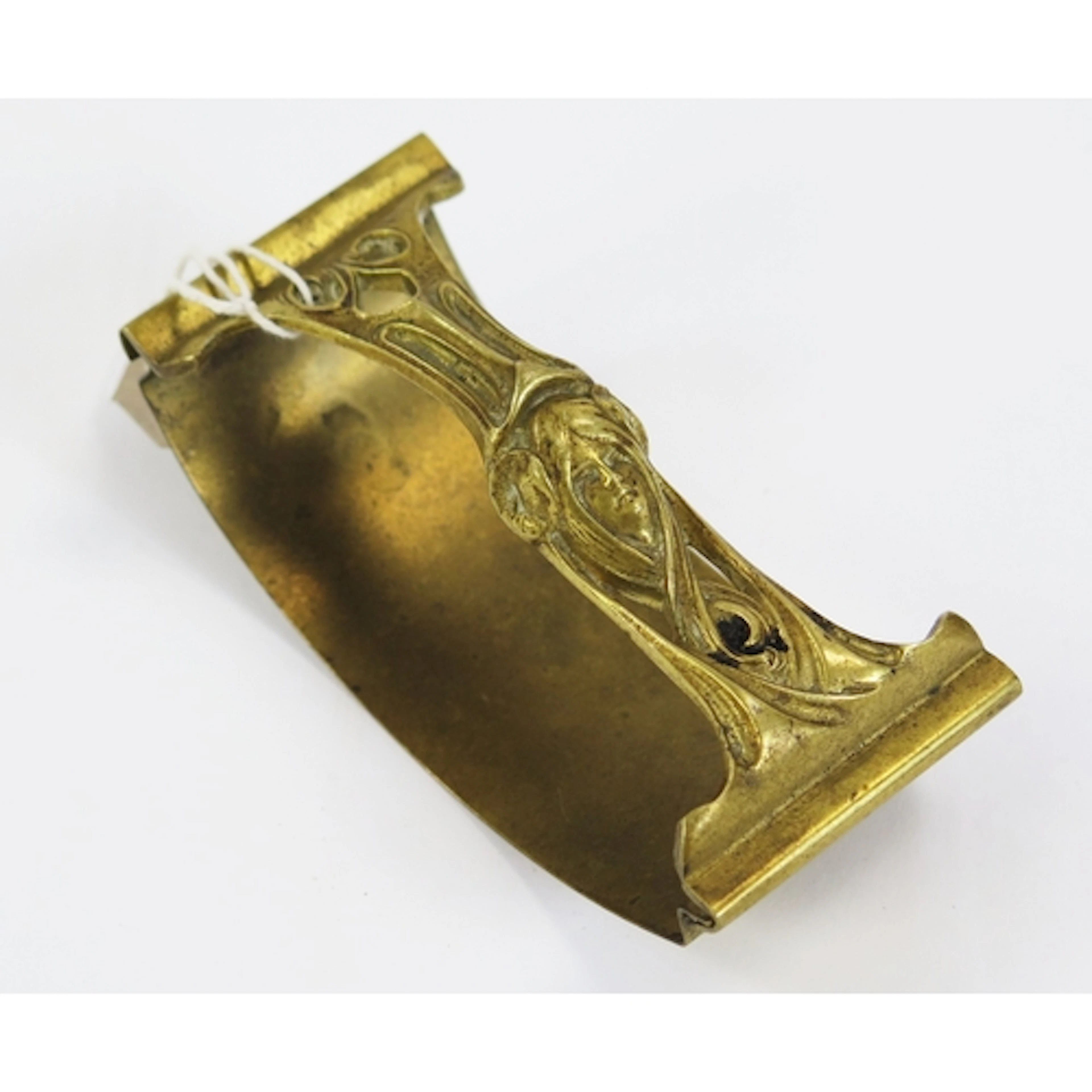 An Art Nouveau period gilt brass blotter, with female mask d...