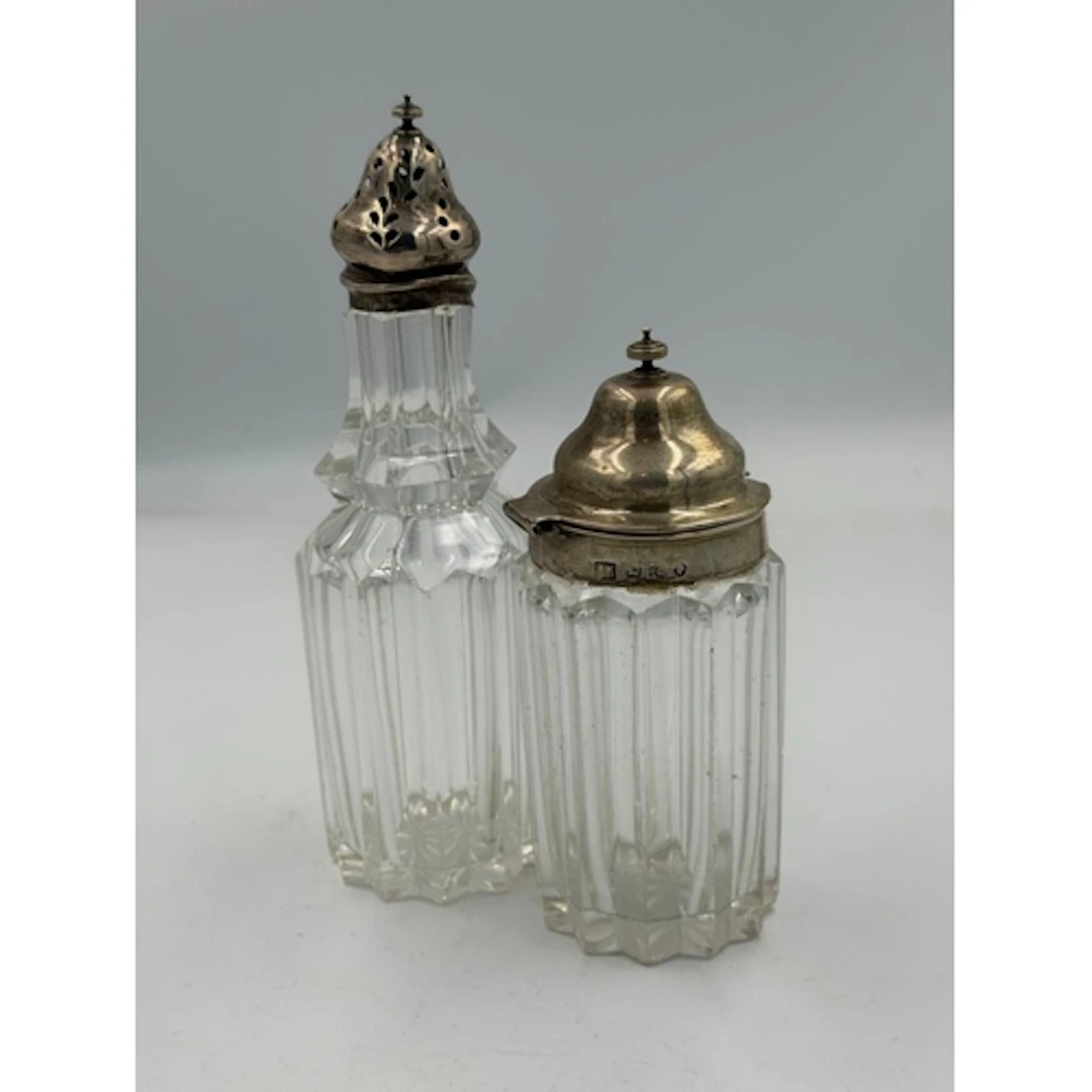 Two AF hallmarked silver cut glass jars.