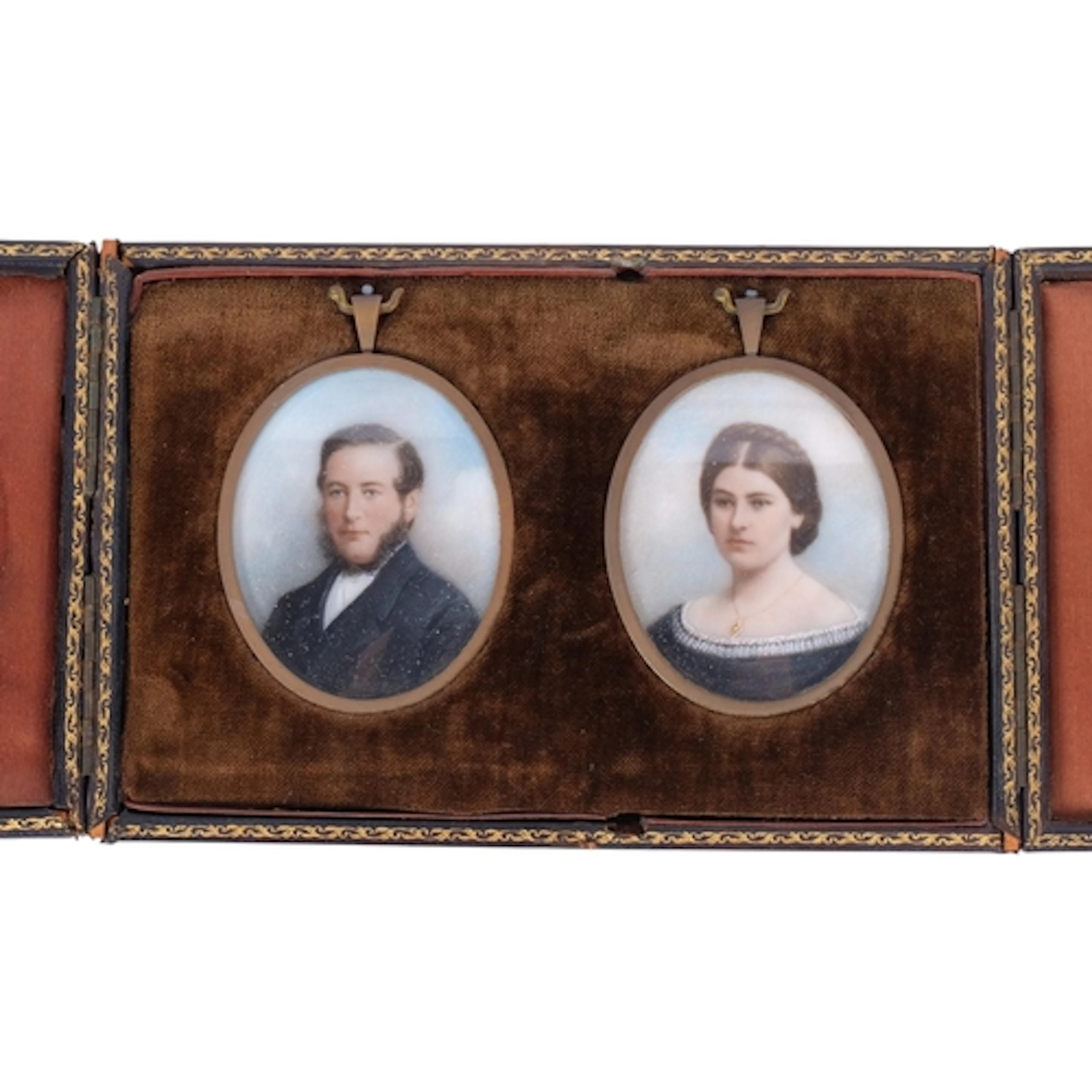 A pair of 19th century oval watercolours on ivory, portrait ...