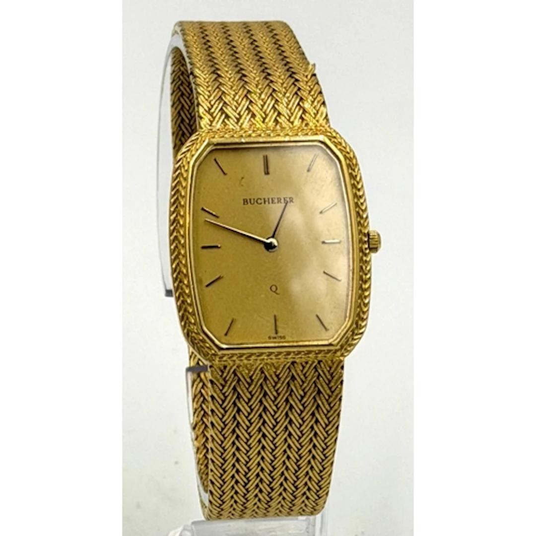 An 18ct gold Bucherer dress watch on mesh style bracelet wit...