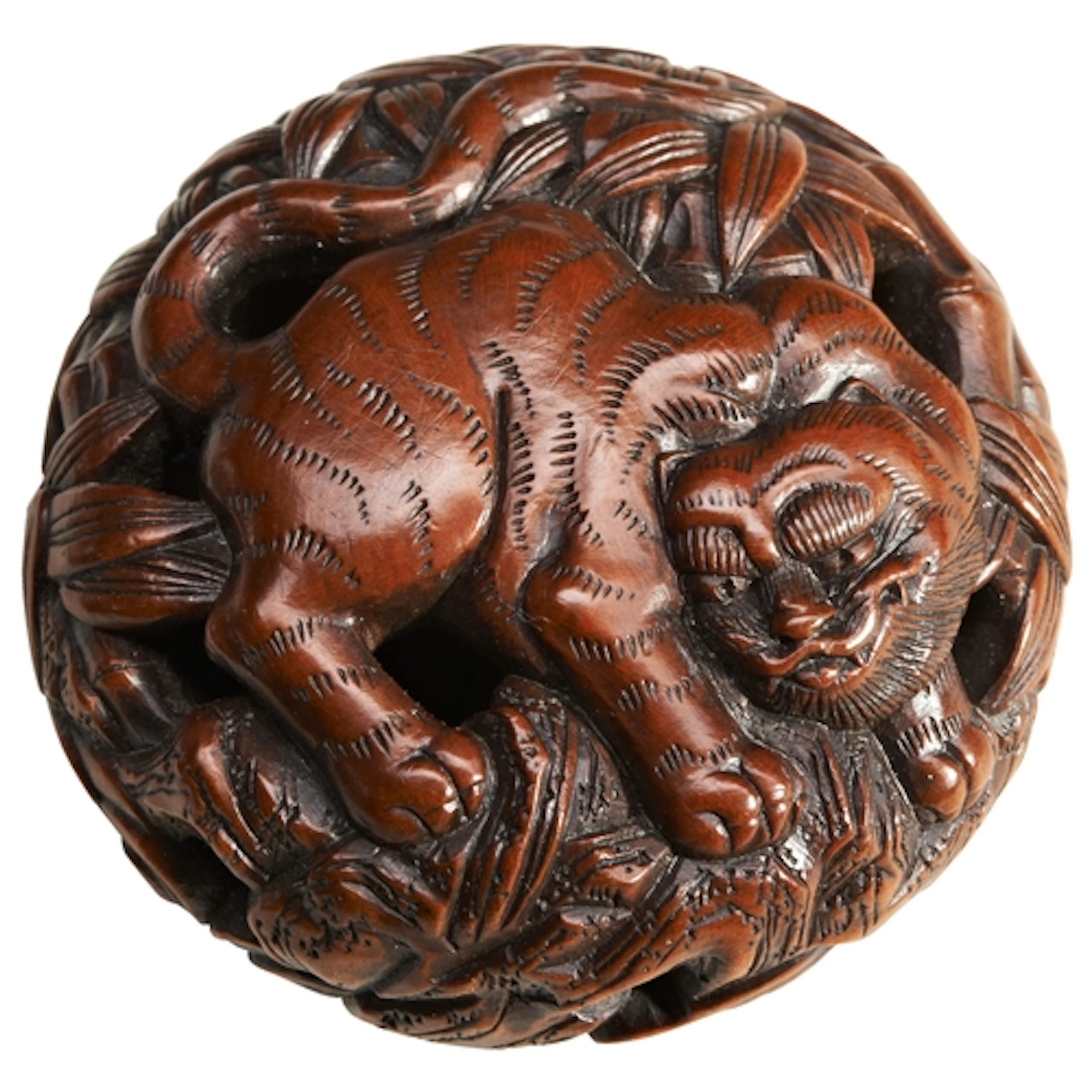 A JAPANESE CARVED BOXWOOD MANJU NETSUKE 19TH CENTURY finely ...