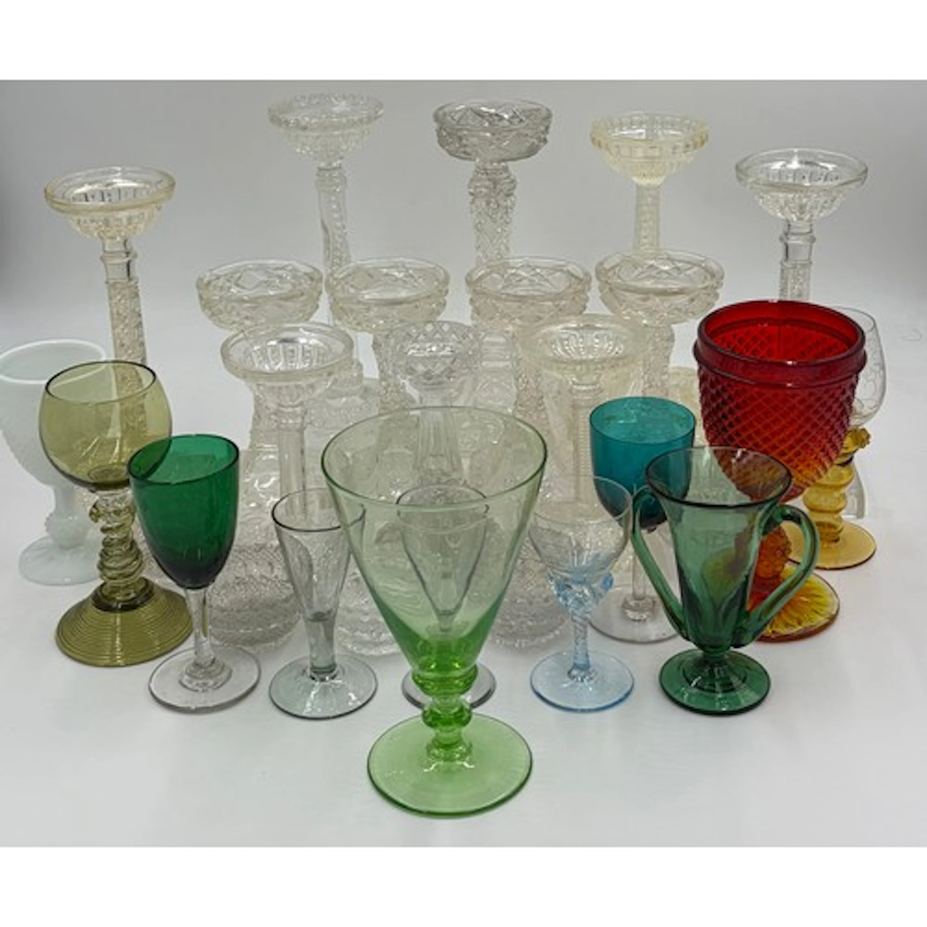 A collection of glass to include a large green uranium conic...