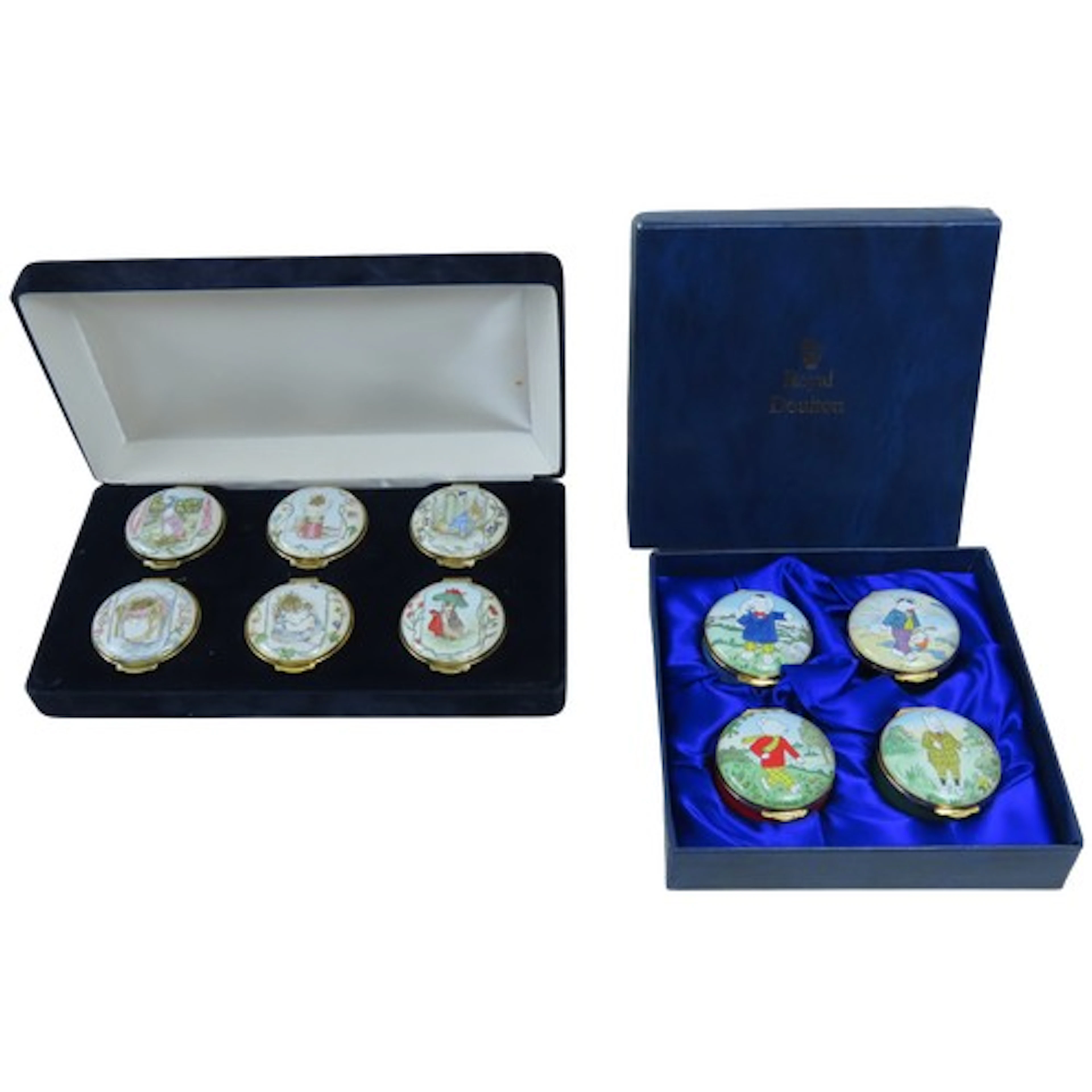 A SET OF FOUR ROYAL DOULTON 'RUPERT THE BEAR' ENAMELLED BOXE...