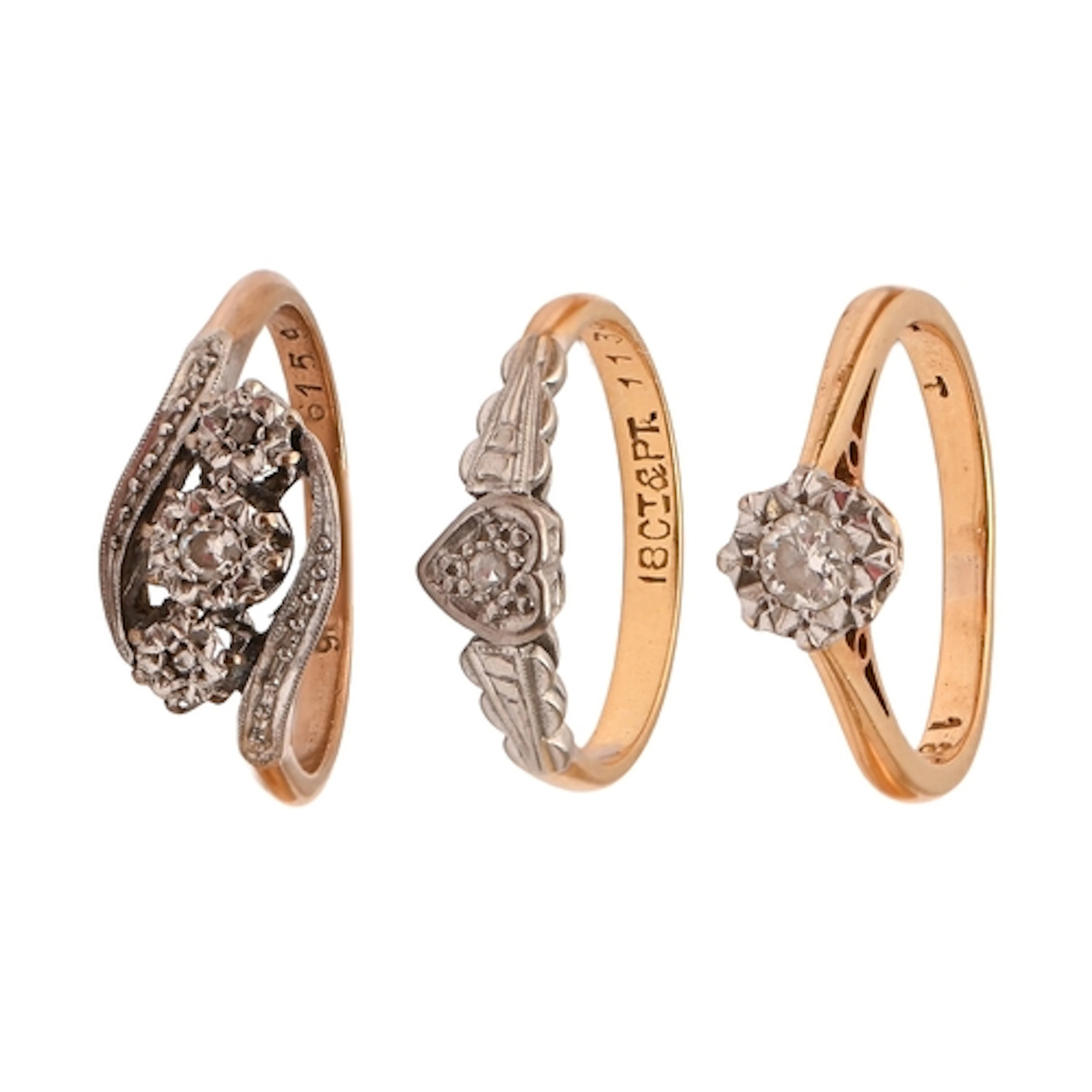 Three diamond rings, in gold or with gold hoop, marked 18ct,...