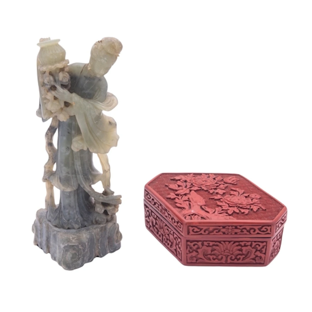 A Chinese cinnabar lacquer box and cover of lozenge shaped f...