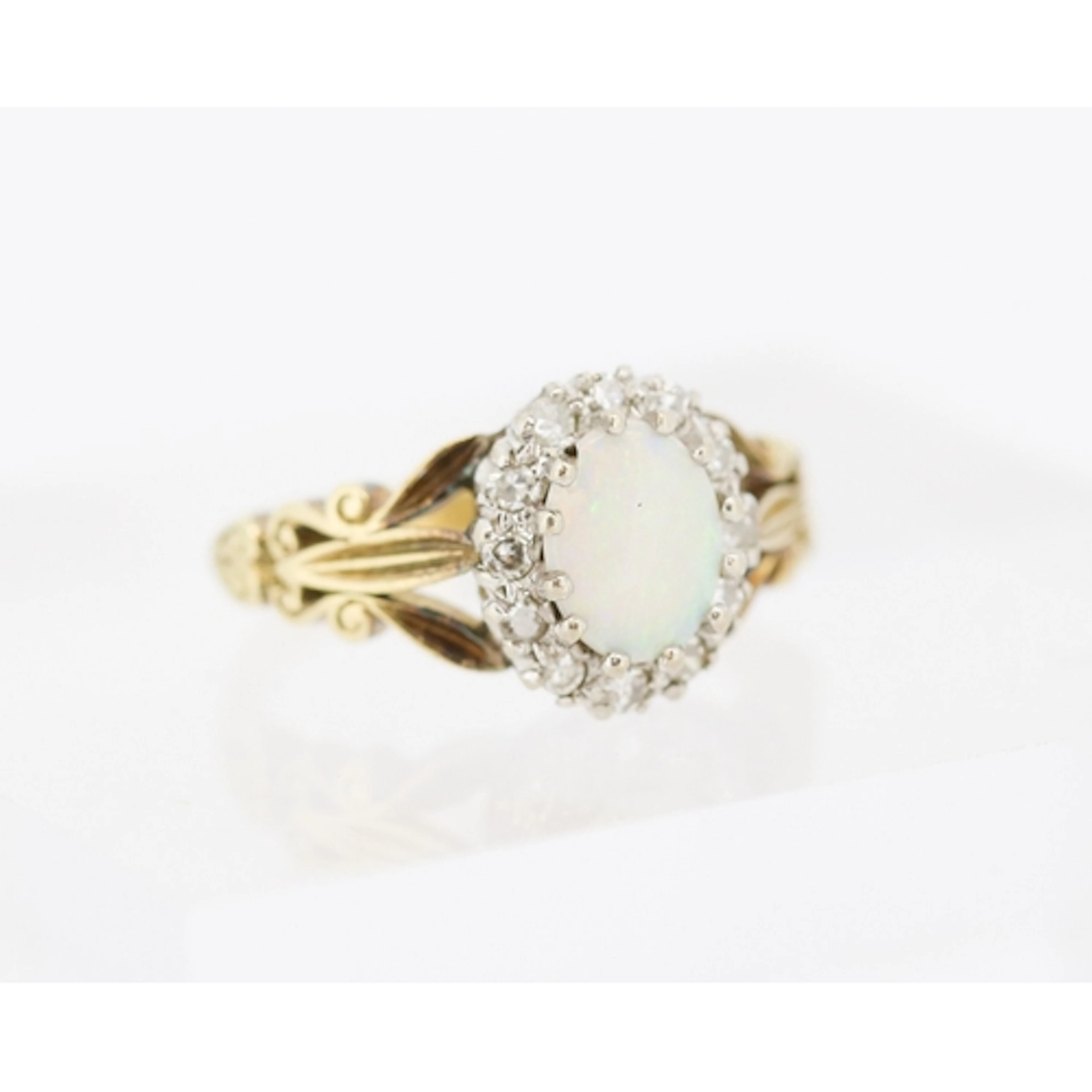 Finely Detailed Opal Centre Stone Ring with Diamond Set Halo...