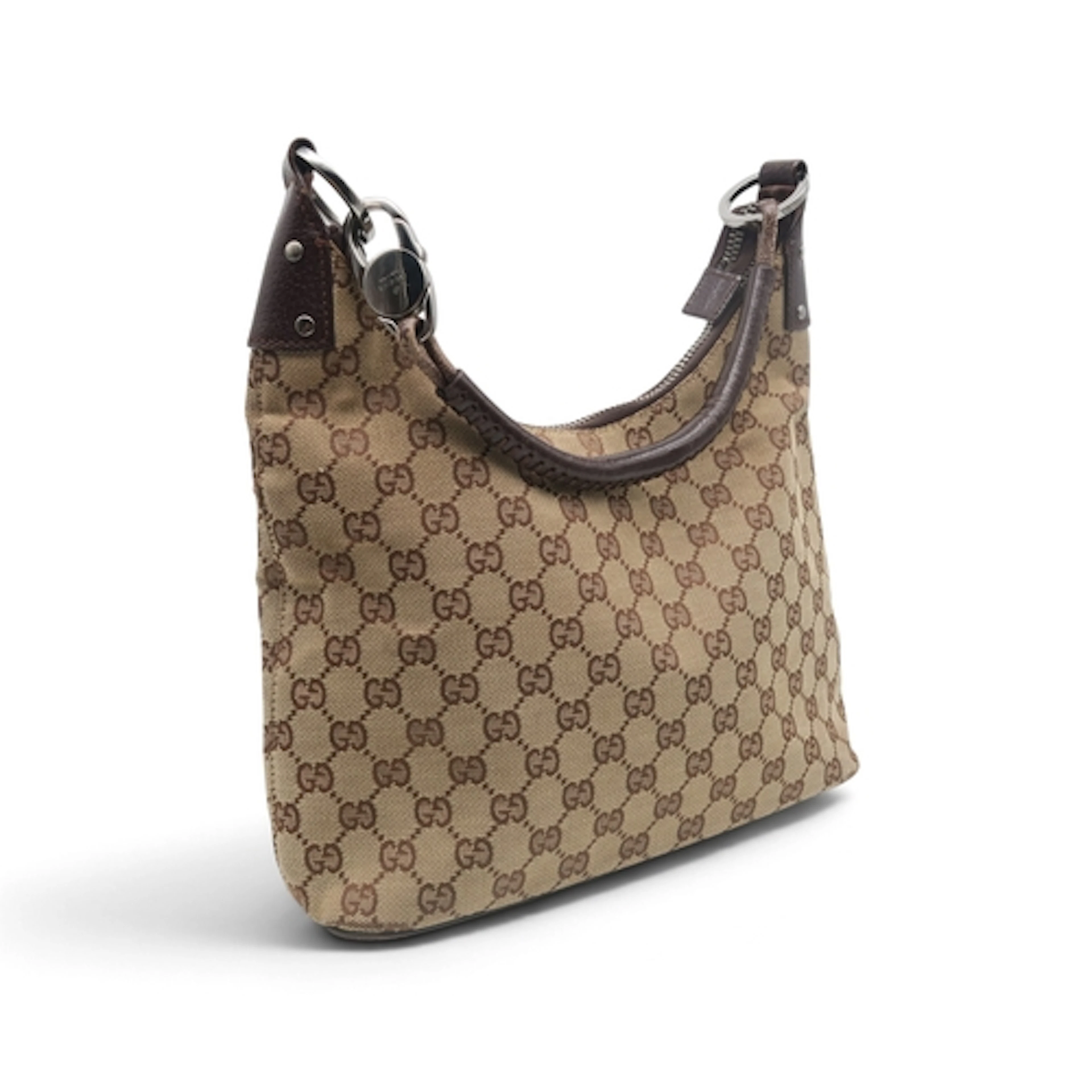 A Gucci GG shoulder bag in monogram jacquard canvas with bro...