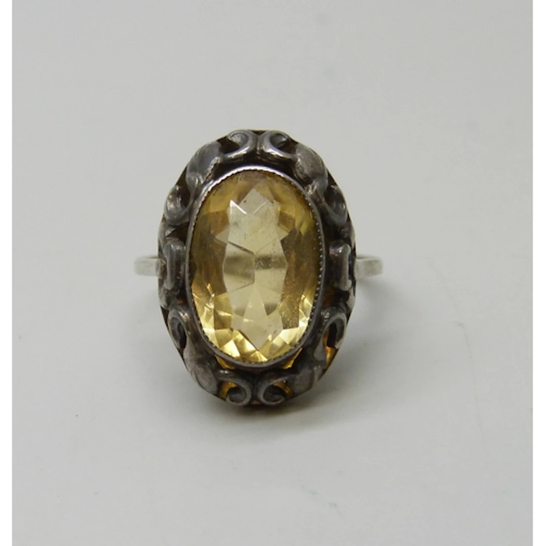 An early 20th century Arts & Crafts .835 silver ring set wit...