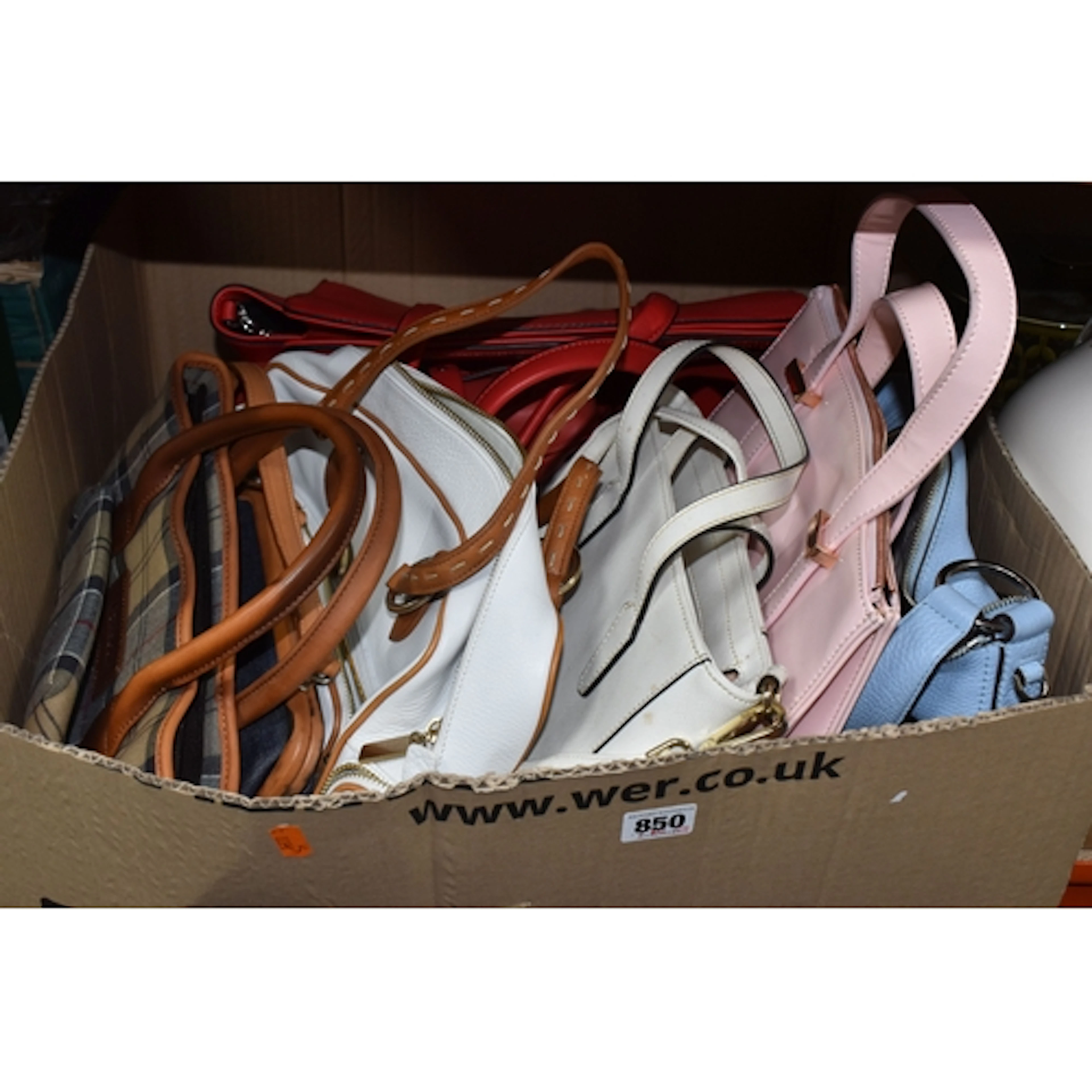 A BOX OF HANDBAGS, eight handbags to include a small Barbour...