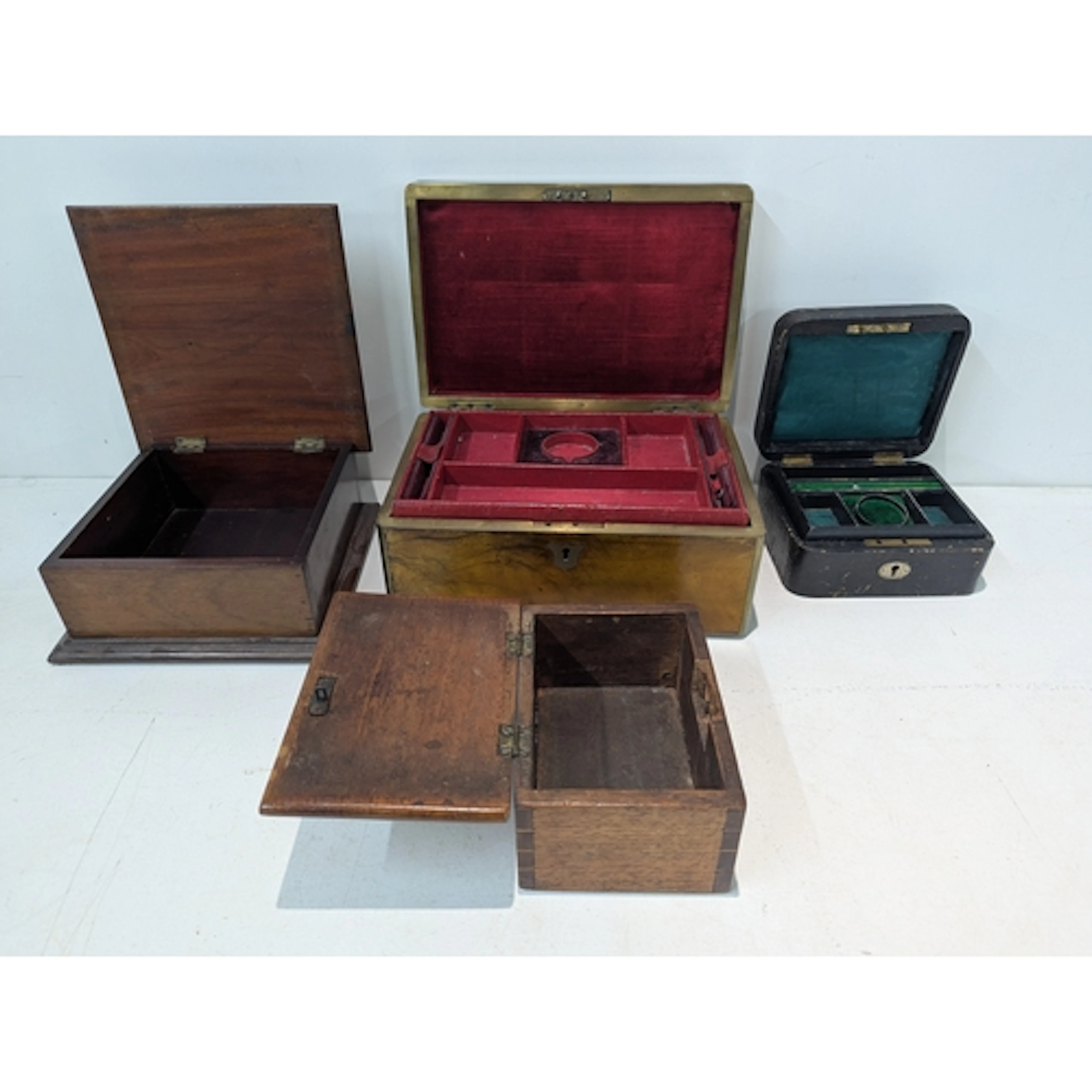 Four boxes to include two travelling boxes and two plain squ...