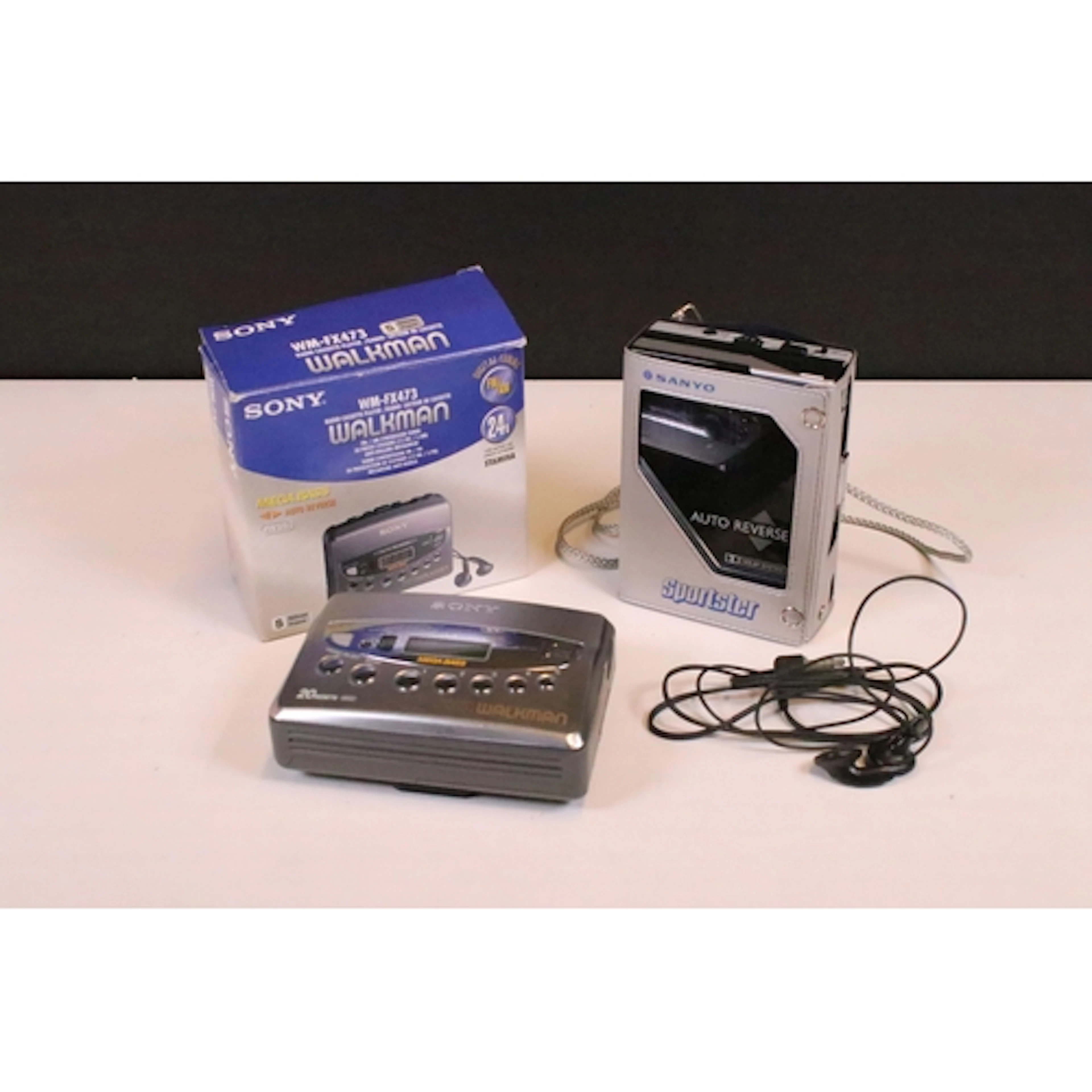 Boxed Sony Walkman (WM-FX473) together with a Sanyo Stereo C...