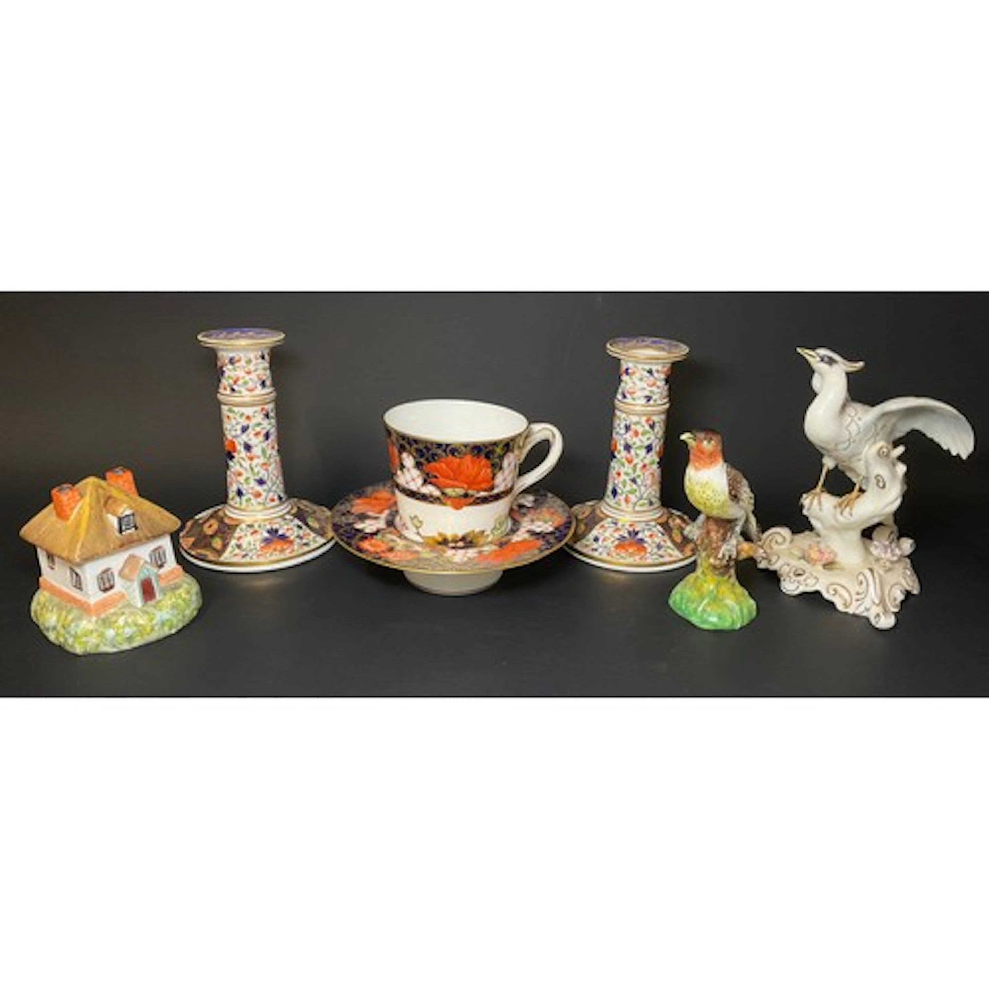 A pair of early 19th century Derby candlesticks, in the Imar...