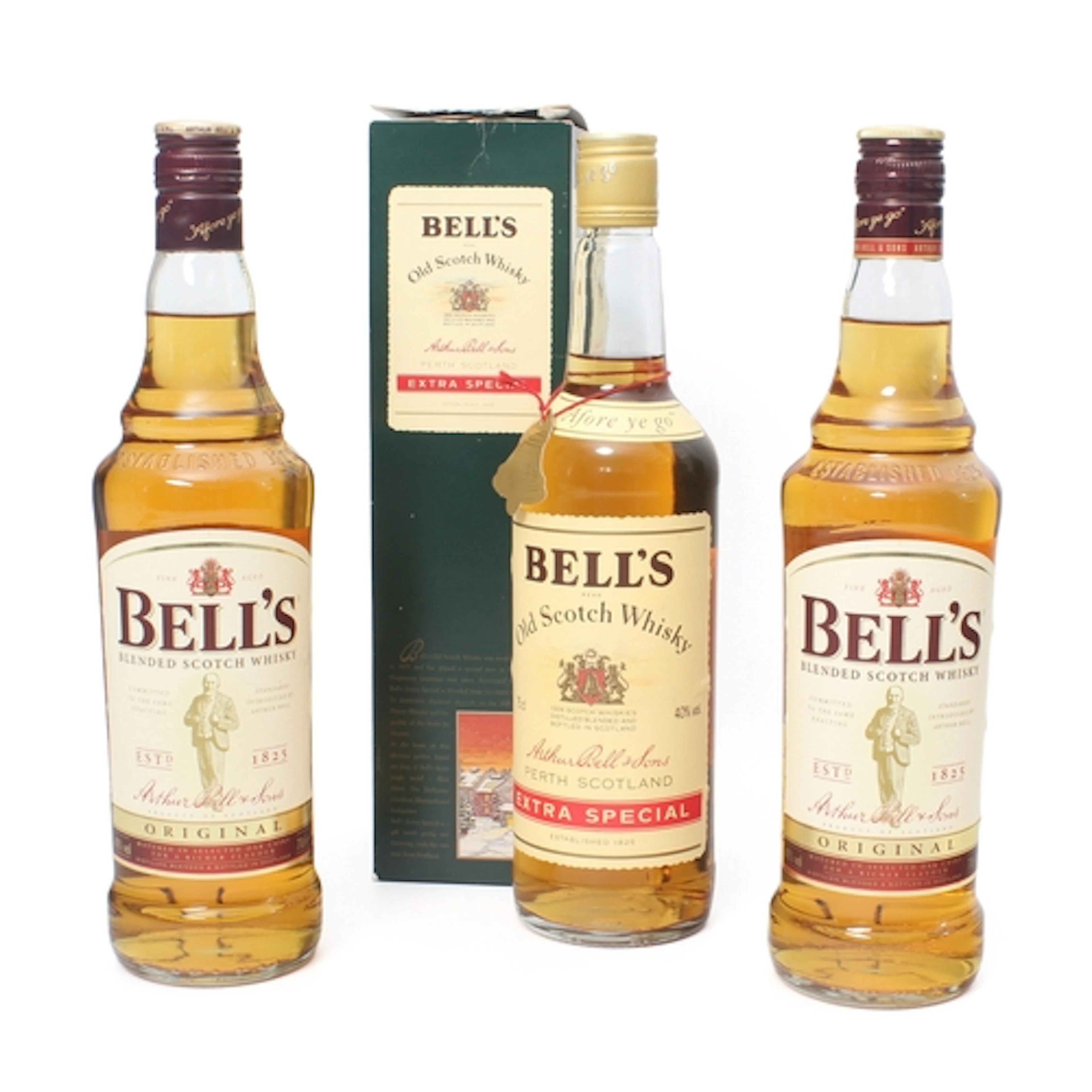 Three bottles of Bell's blended whisky, (2 x 70cl and 1 x 75...