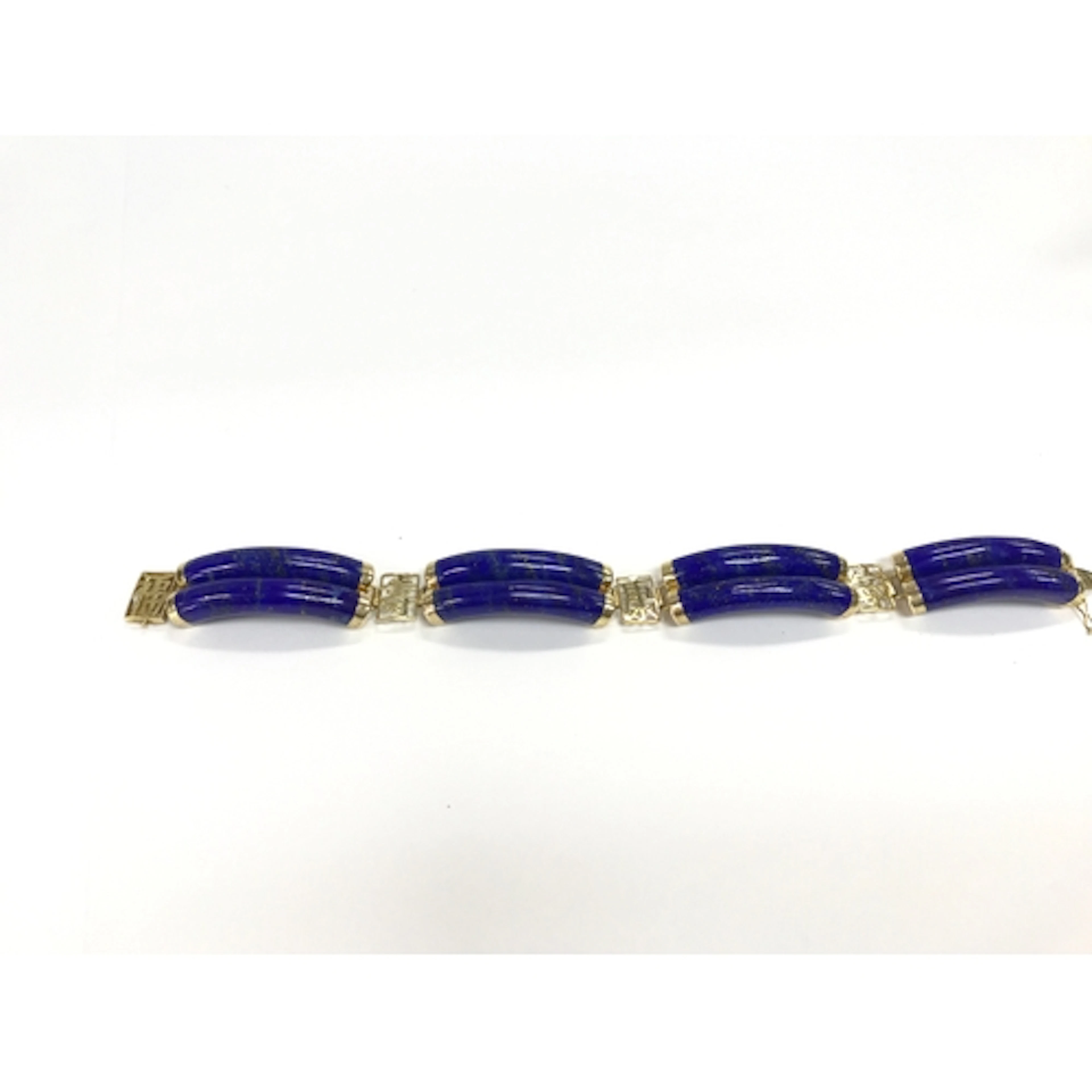 A 14k Chinese style link bracelet made with curved lapis laz...