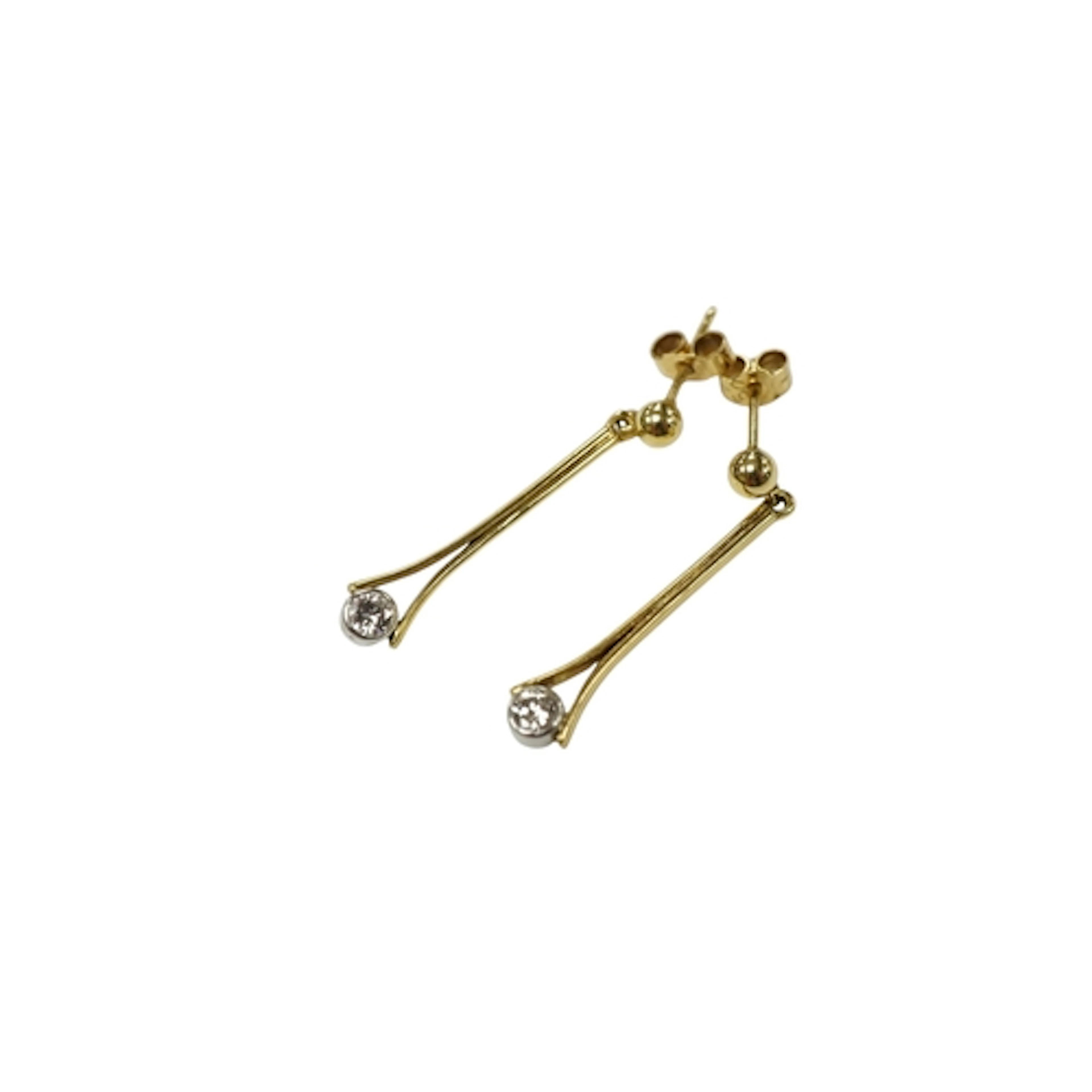 A pair of yellow metal and single stone diamond set drop ear...
