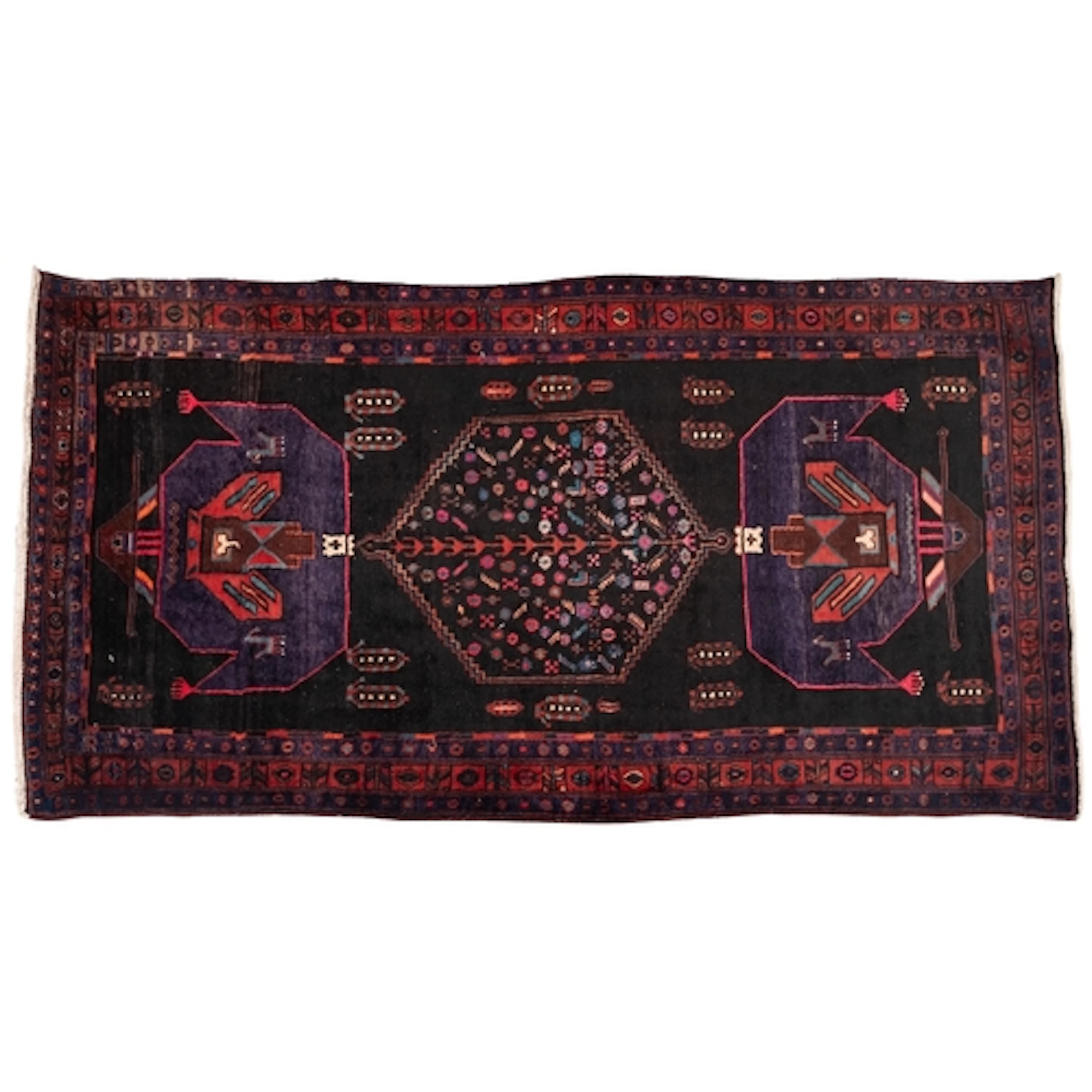 A Contemporary Iranian rug, the black field with a central s...