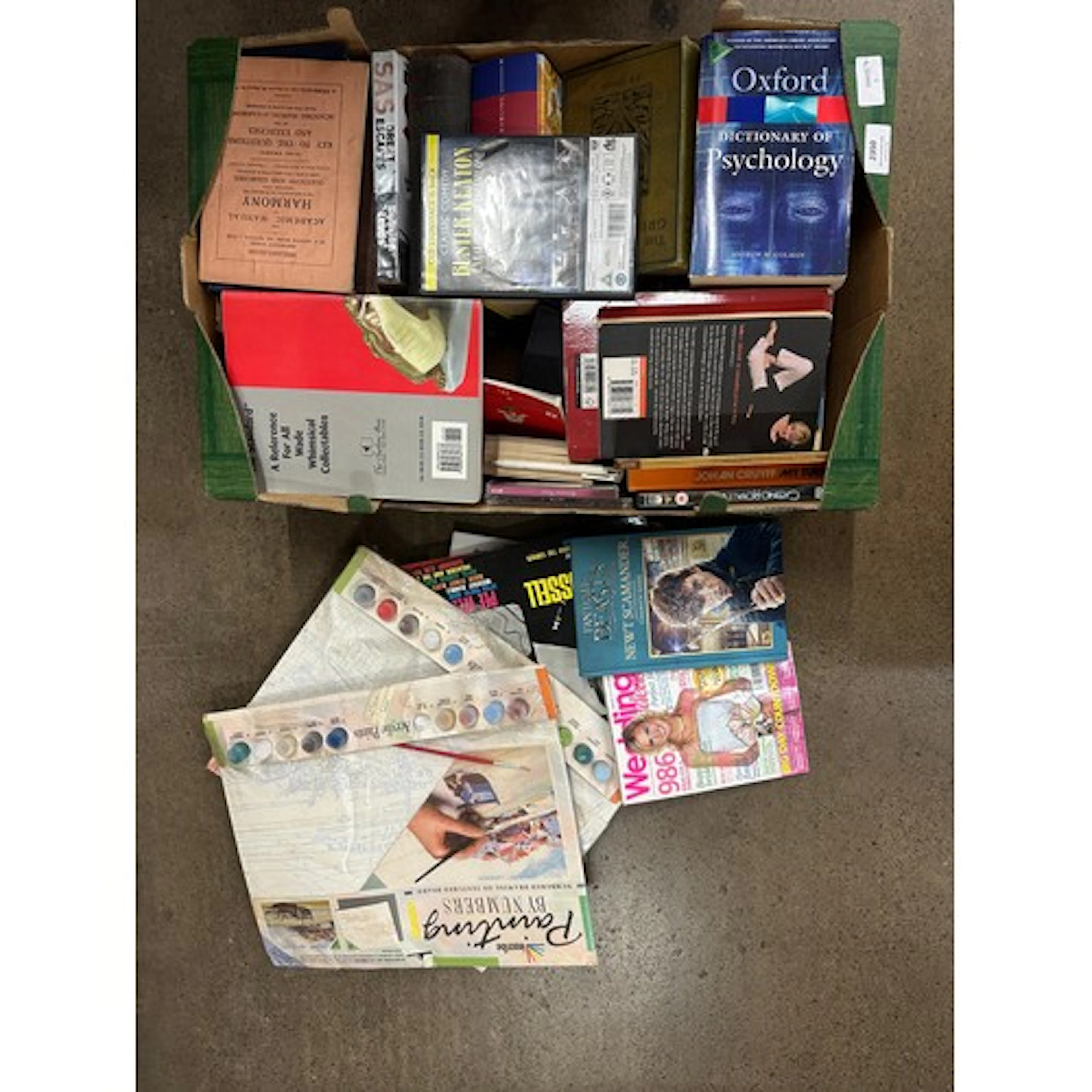 A box of books, Harry Potter first edition, vintage newspape...