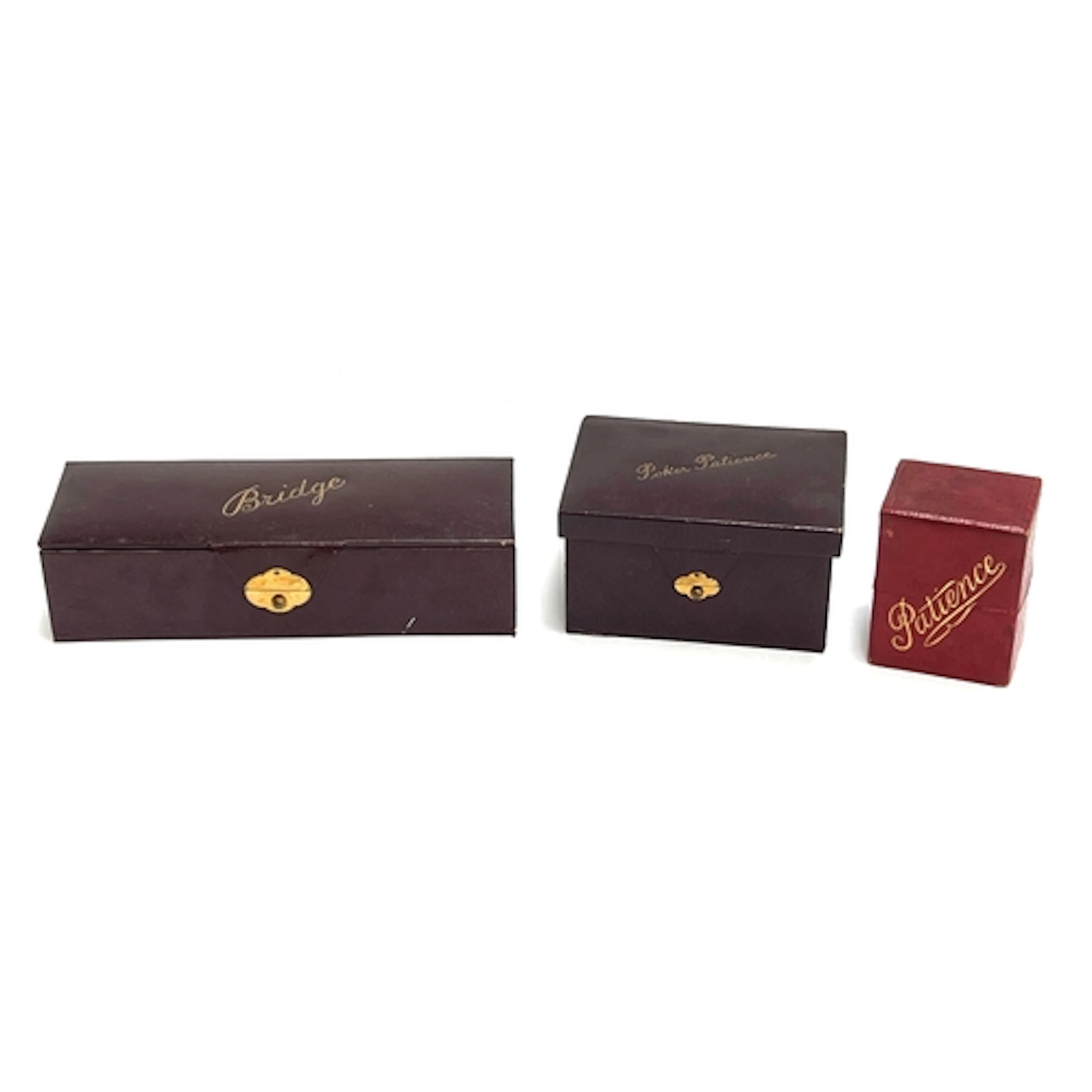 Three early 20th century leather cased card games: Bridge, P...