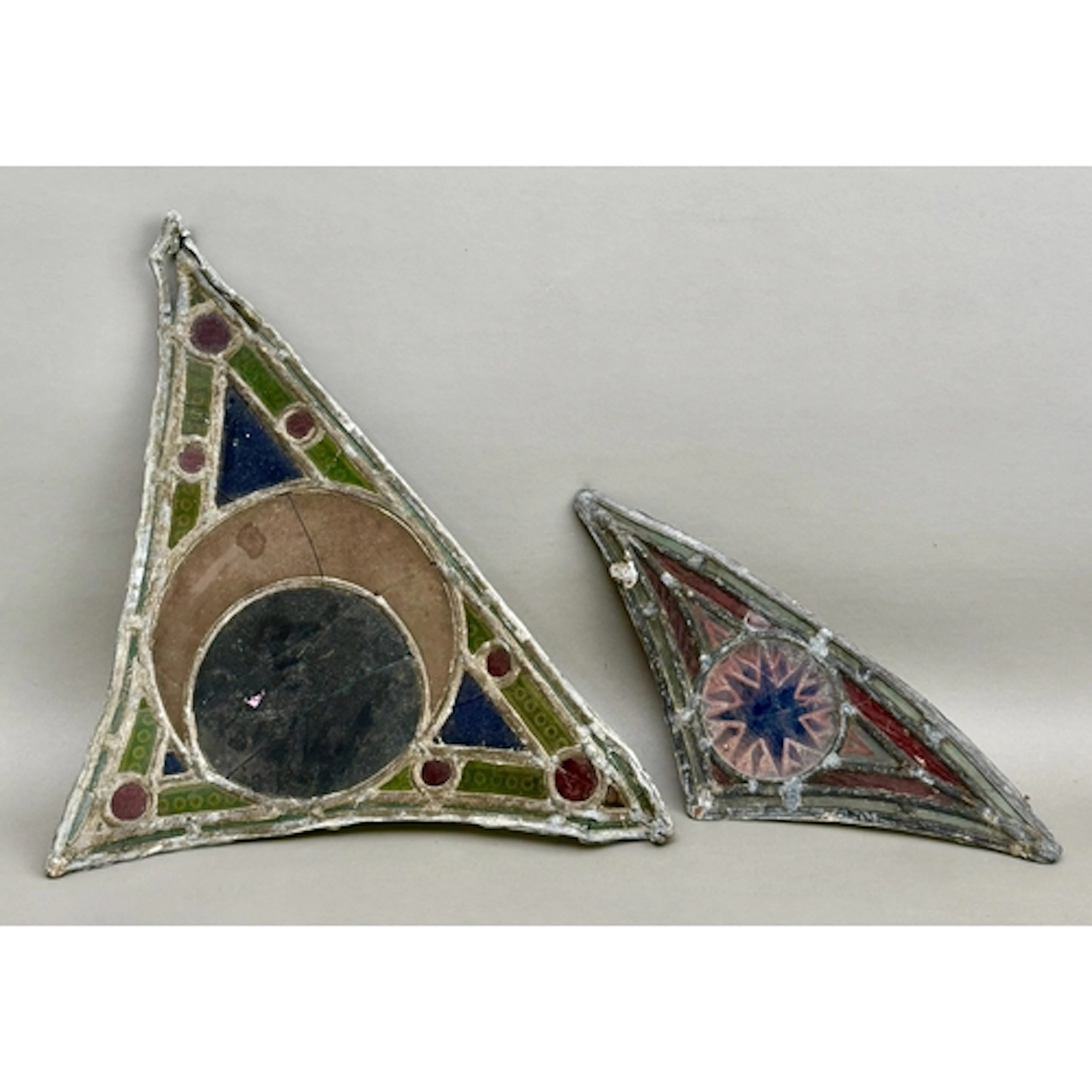 Two triangular pieces of nineteenth century leaded stained g...