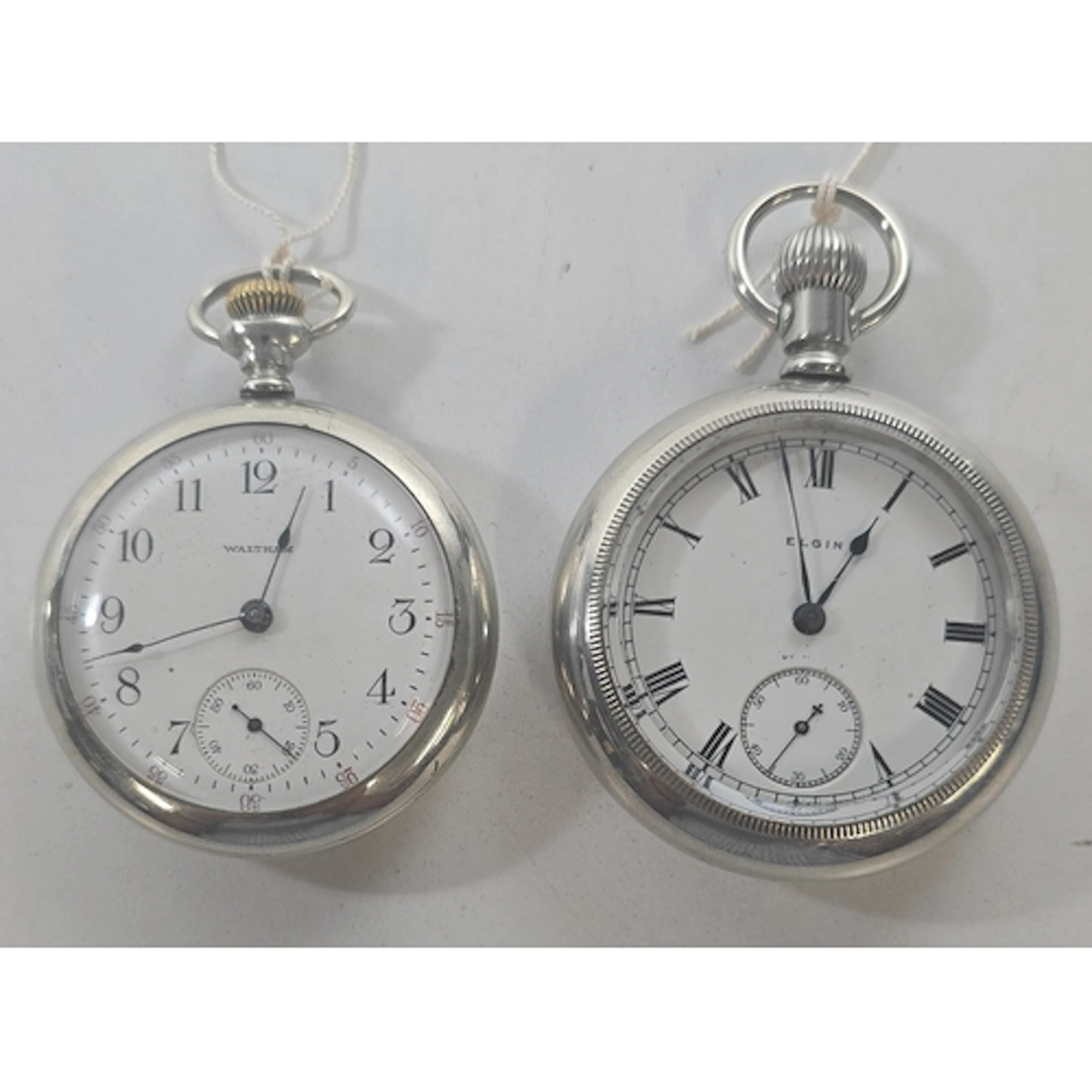 Two Railway Pocket Watches: pre 1923 7 jewel by Elgin the ba...
