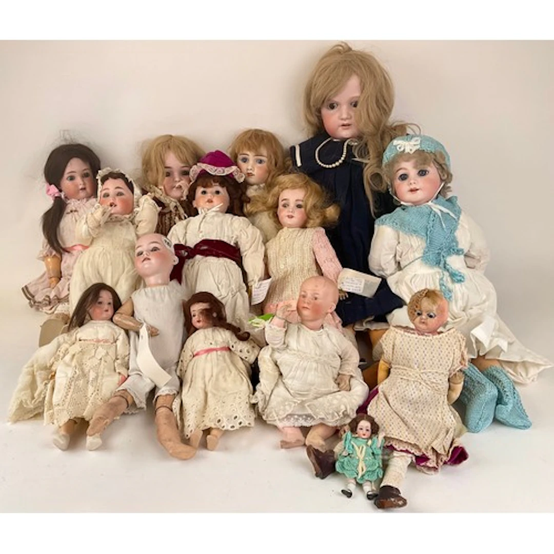 Dolls - A late 19th century wax over composition shoulder do...