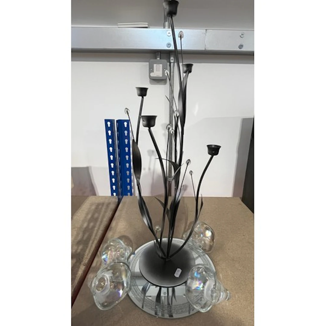 Modern glass candlestick holder centrepiece.