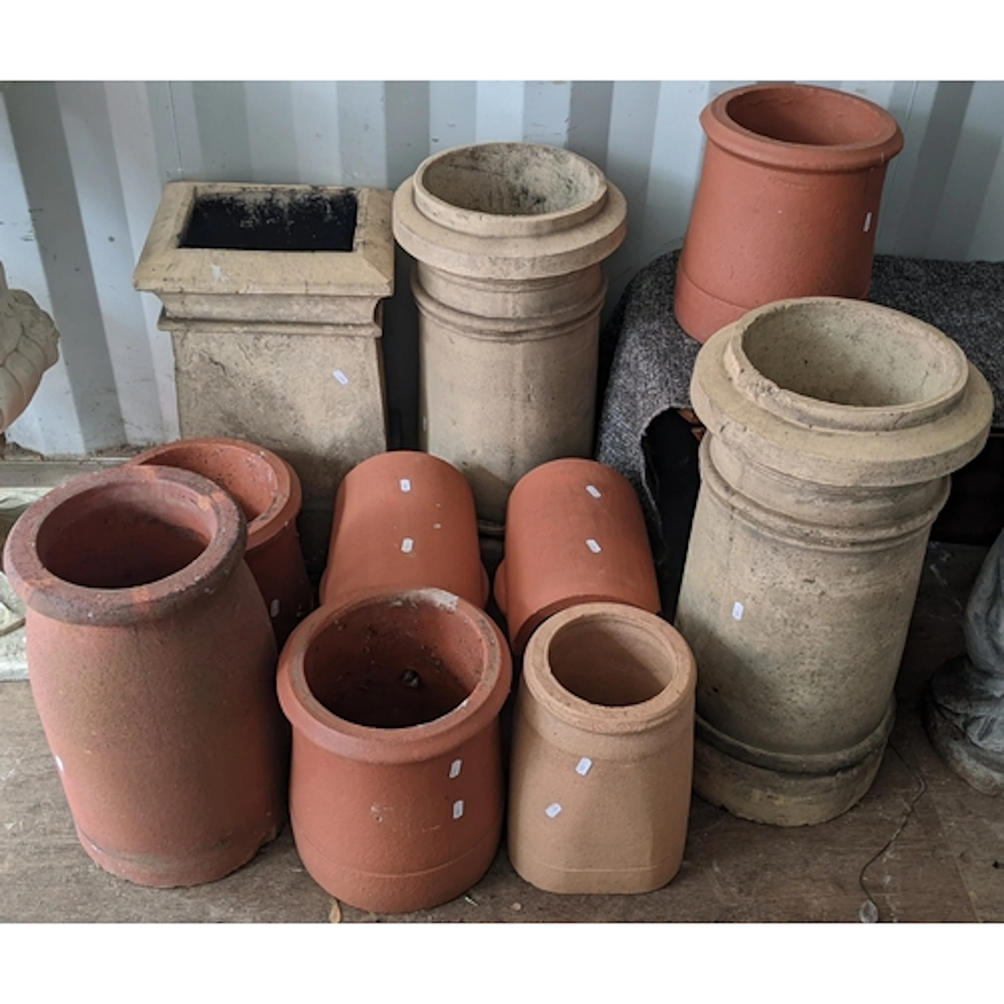 A collection of terracotta and stoneware garden items to inc...