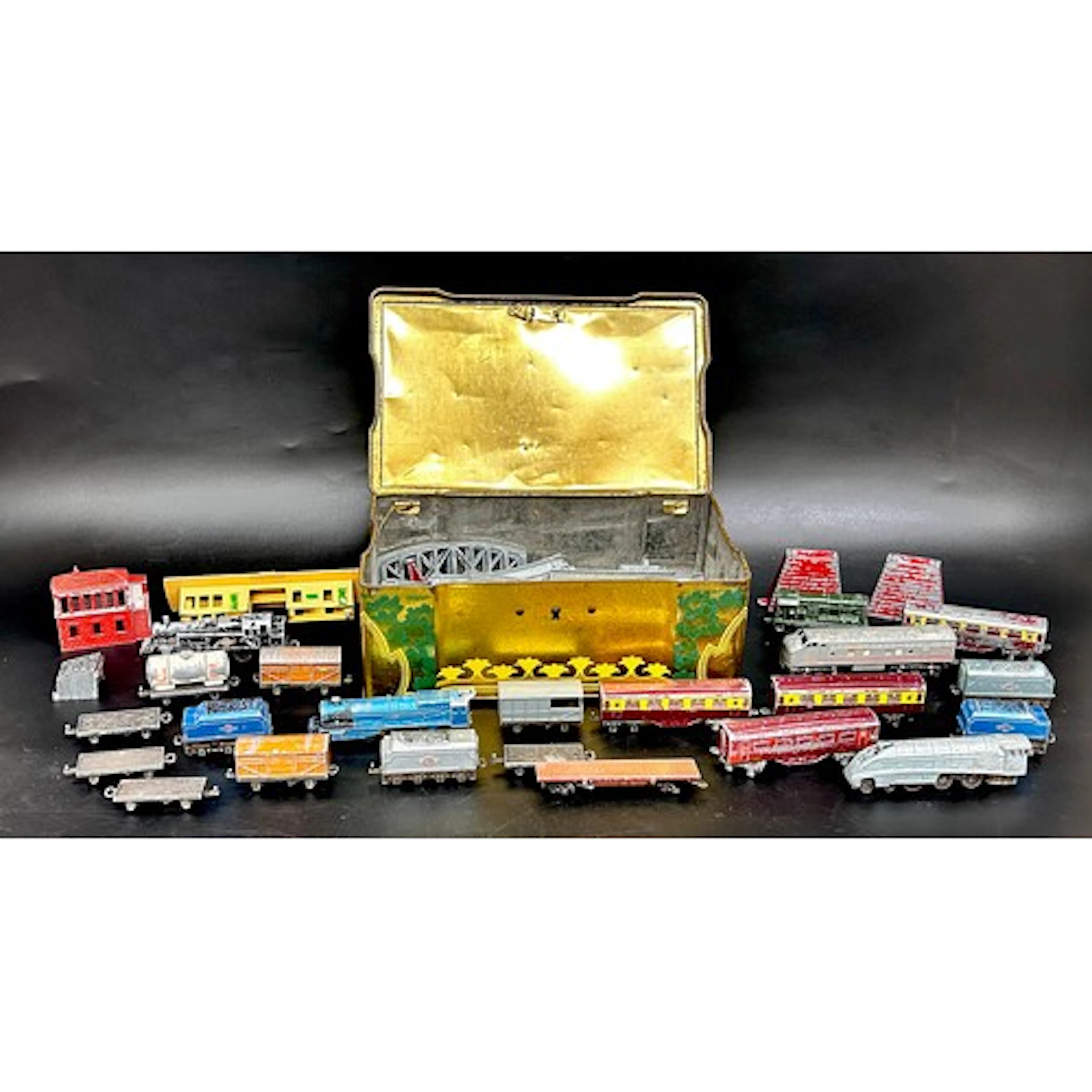 A collection of miniature Lone Star locos tin trains